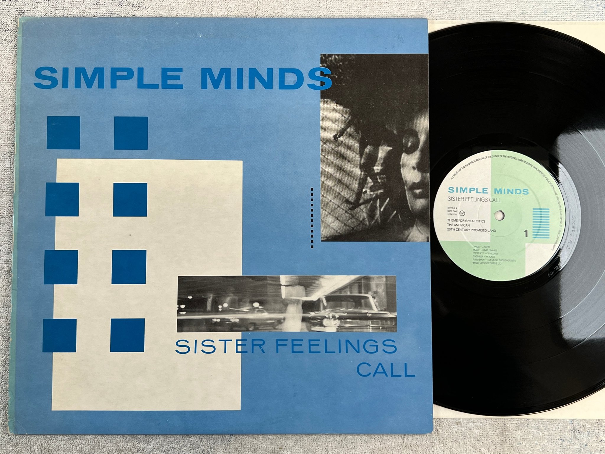 Omslagsbild för skivan SIMPLE MINDS sister feelings call LP -81 UK VIRGIN OVED 2