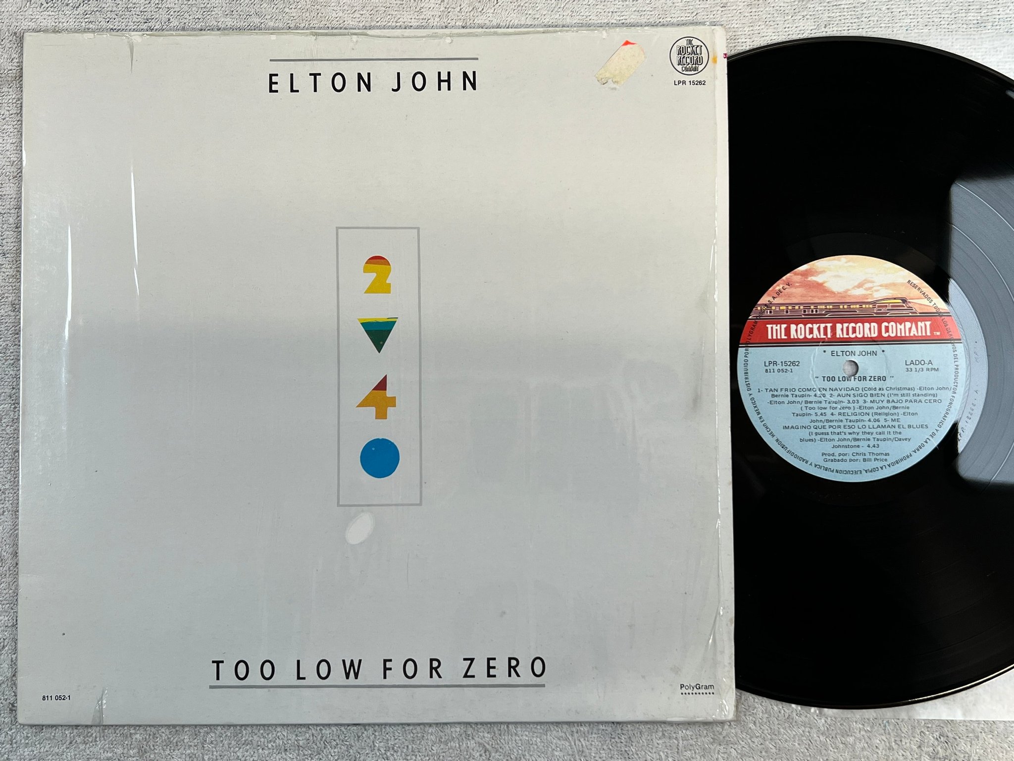 Omslagsbild för skivan ELTON JOHN too low for zero LP -83 Mexico THE ROCKET RECORD COMPANY LPR 15262