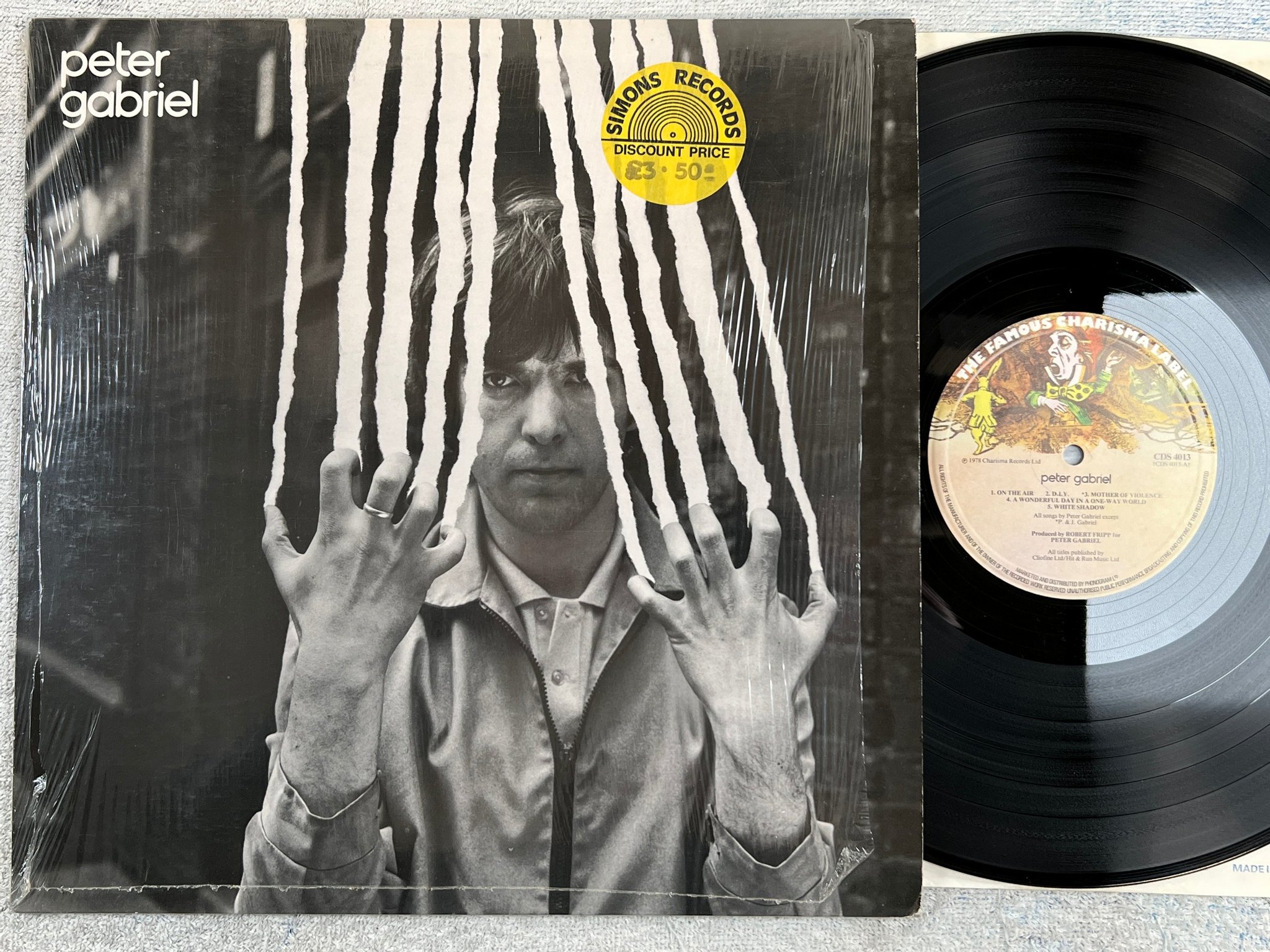 Omslagsbild för skivan PETER GABRIEL s/t LP -78 UK FAMOUS CHARISMA CDS 4013