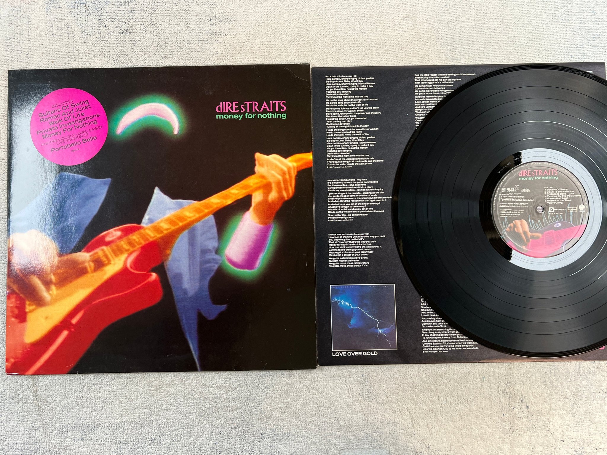 Omslagsbild för skivan DIRE STRAITS money for nothing LP -88 Hol VERTIGO 836419-1
