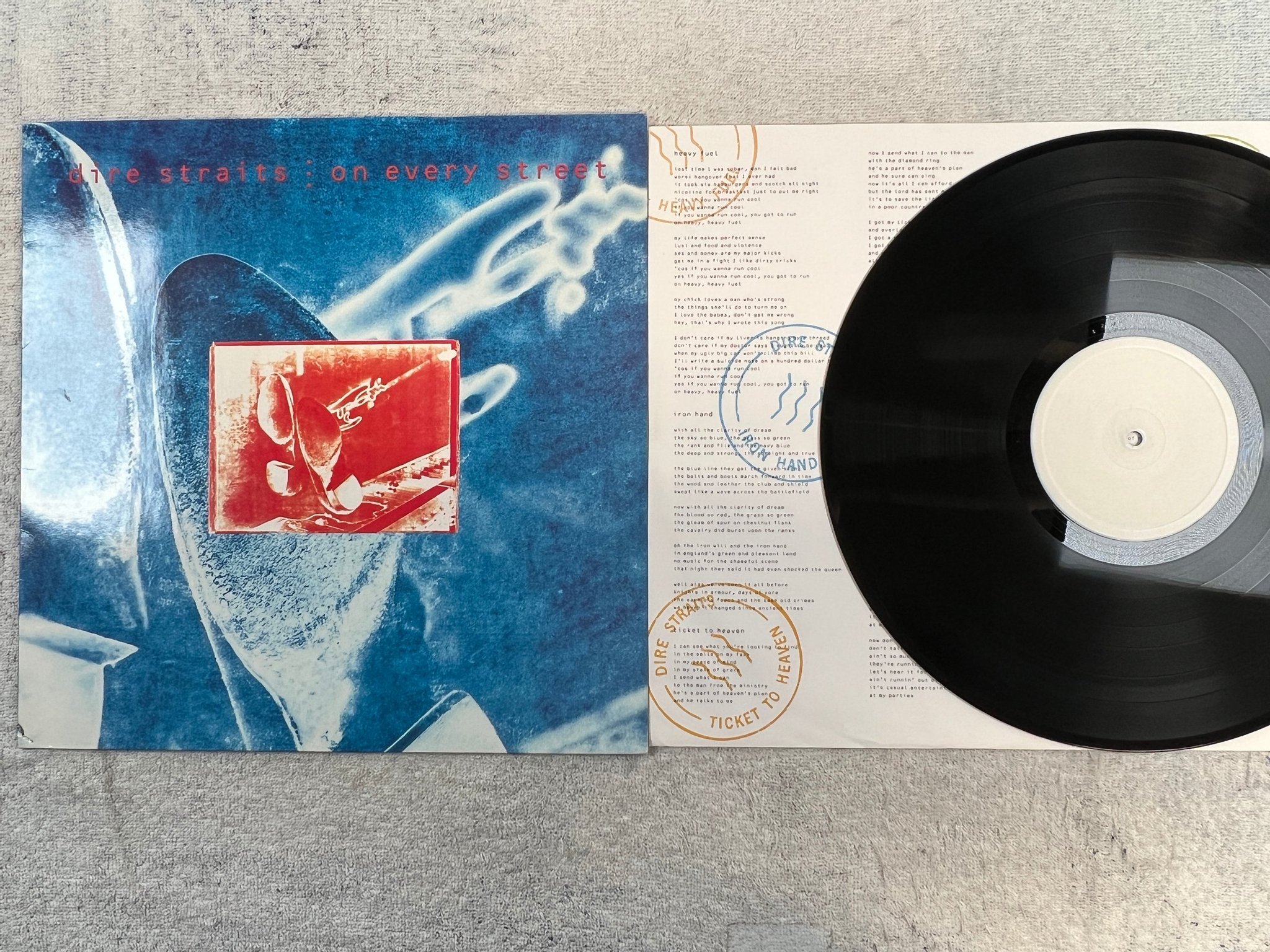 Omslagsbild för skivan DIRE STRAITS On Every Street LP -91 Eur VERTIGO 510160-1 rare white label