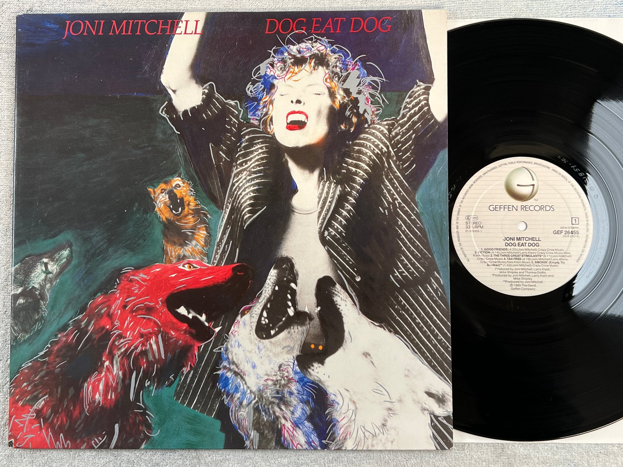 Omslagsbild för skivan JONI MITCHELL dog eat dog LP -85 Hol GEFFEN GEF 26455