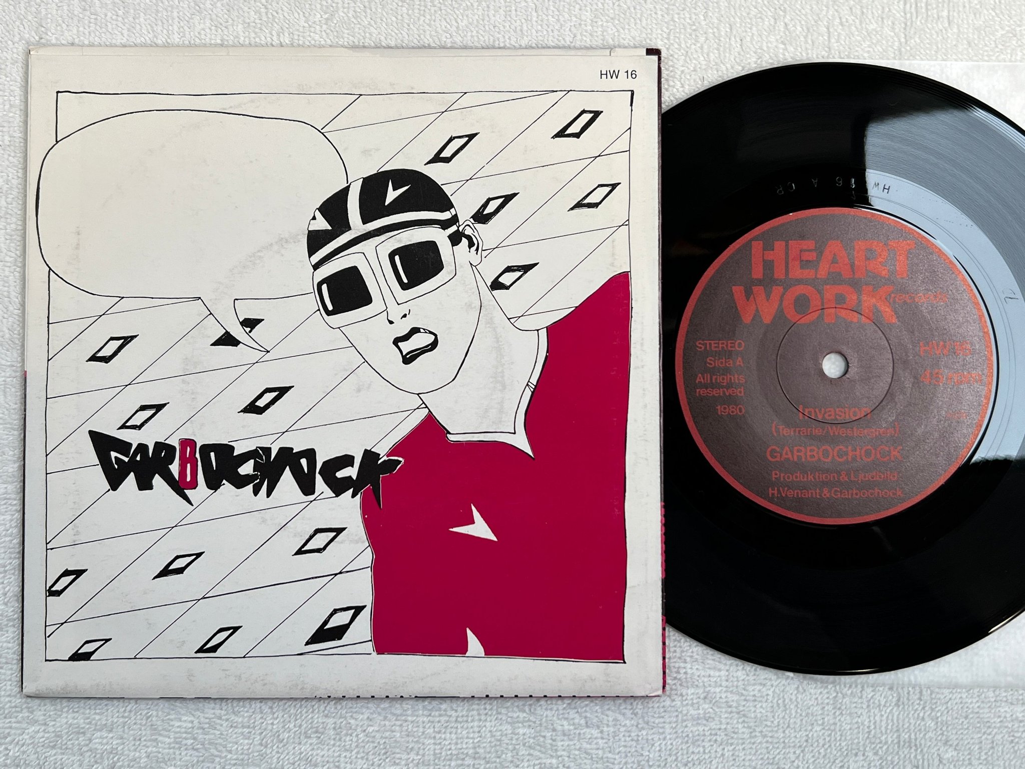 Omslagsbild för skivan GARBOCHOCK invasion 7"single -80 HEART WORK HW 16