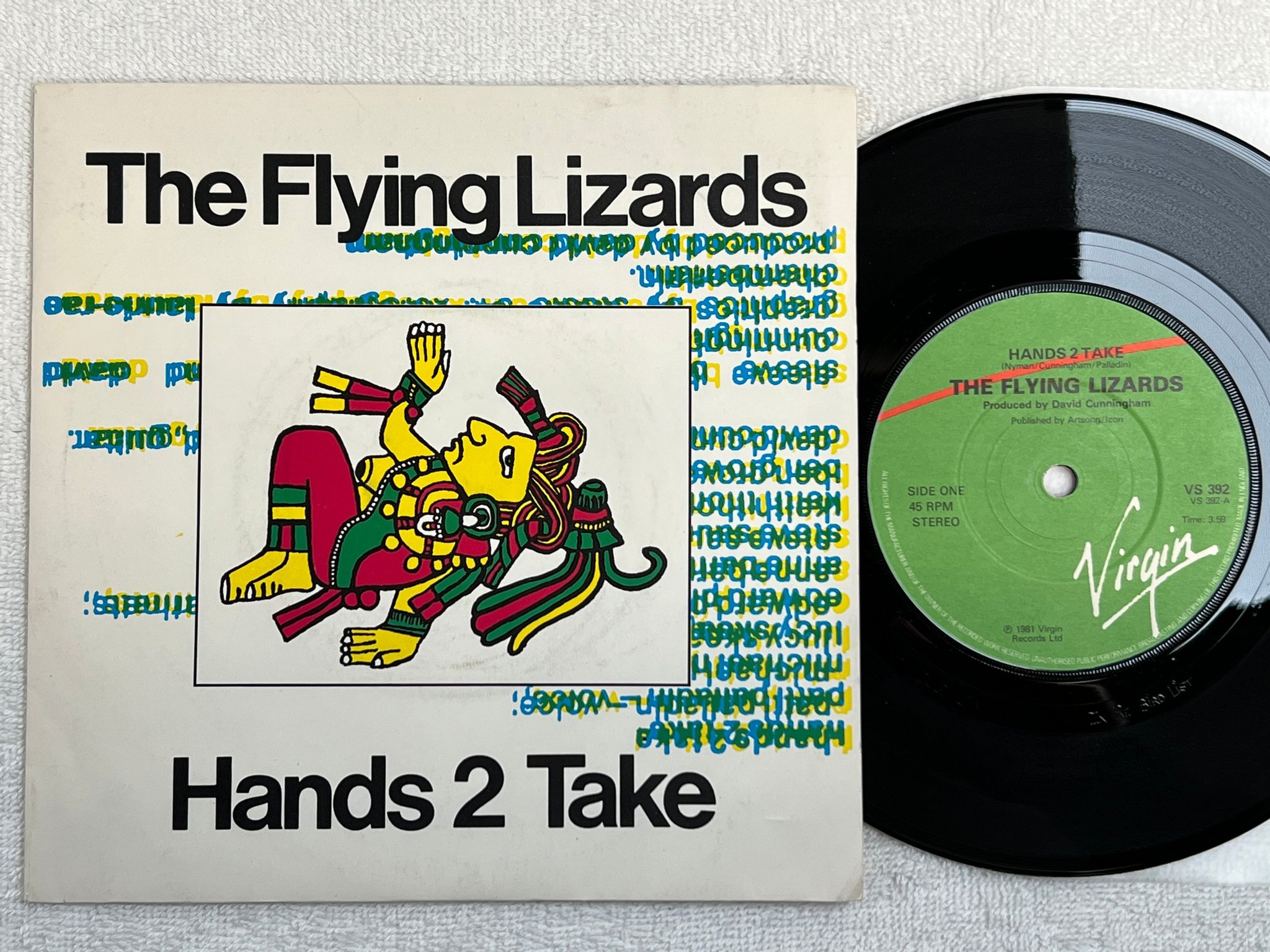 Omslagsbild för skivan THE FLYING LIZARDS hands 2 take 7"single -81 VS 392