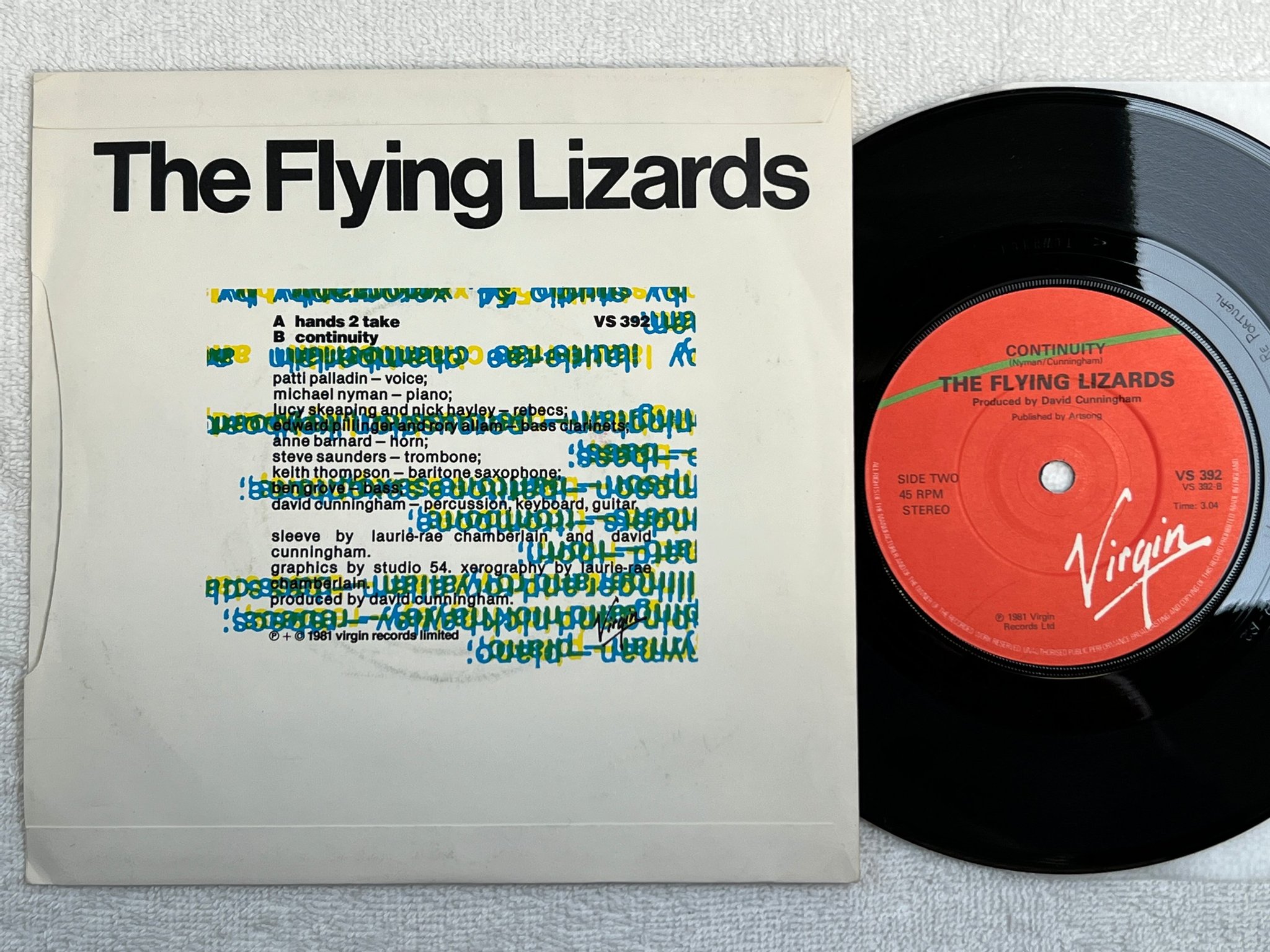 Omslagsbild för skivan THE FLYING LIZARDS hands 2 take 7"single -81 VS 392