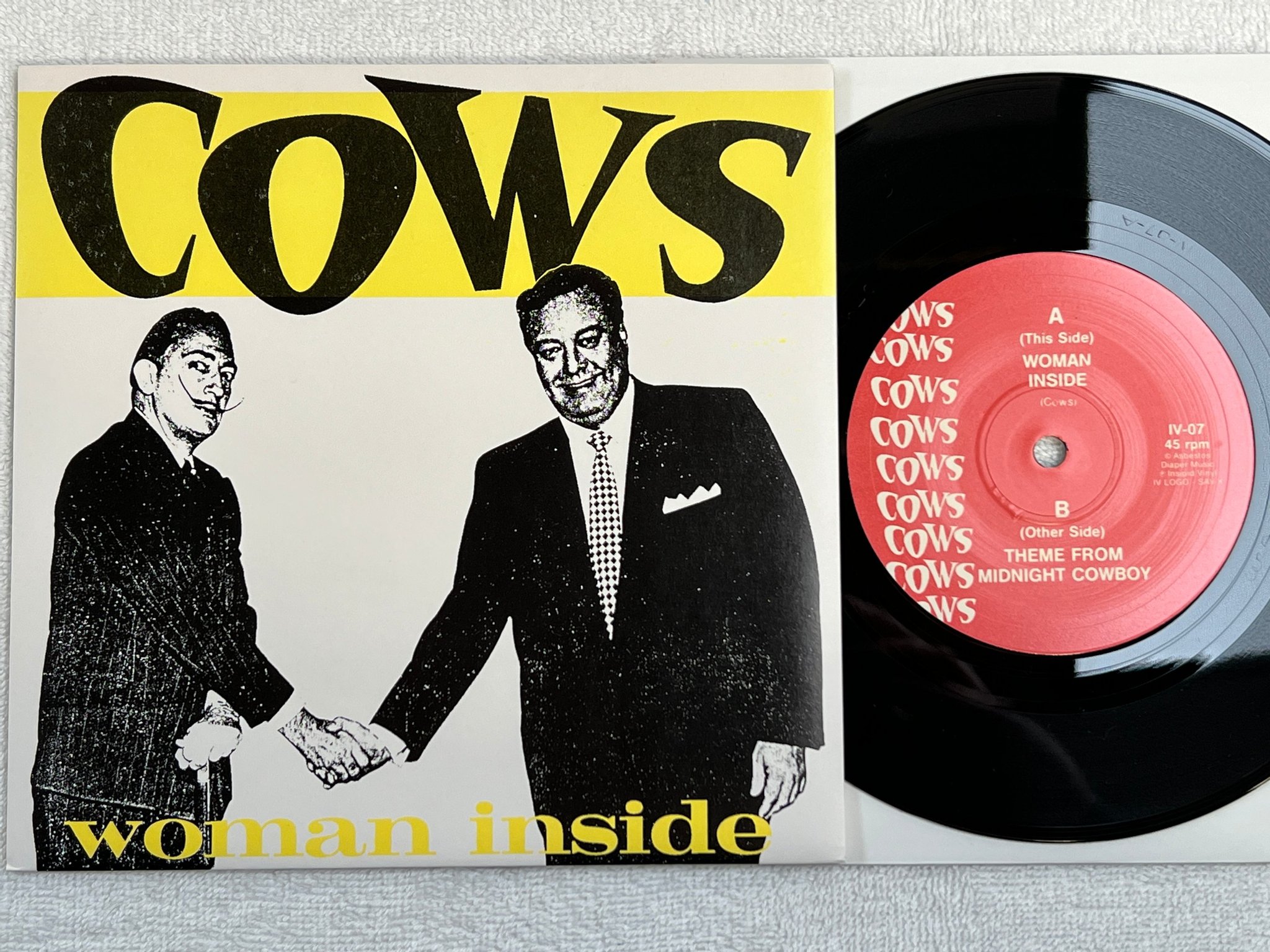 Omslagsbild för skivan COWS woman inside 7"single IV-07