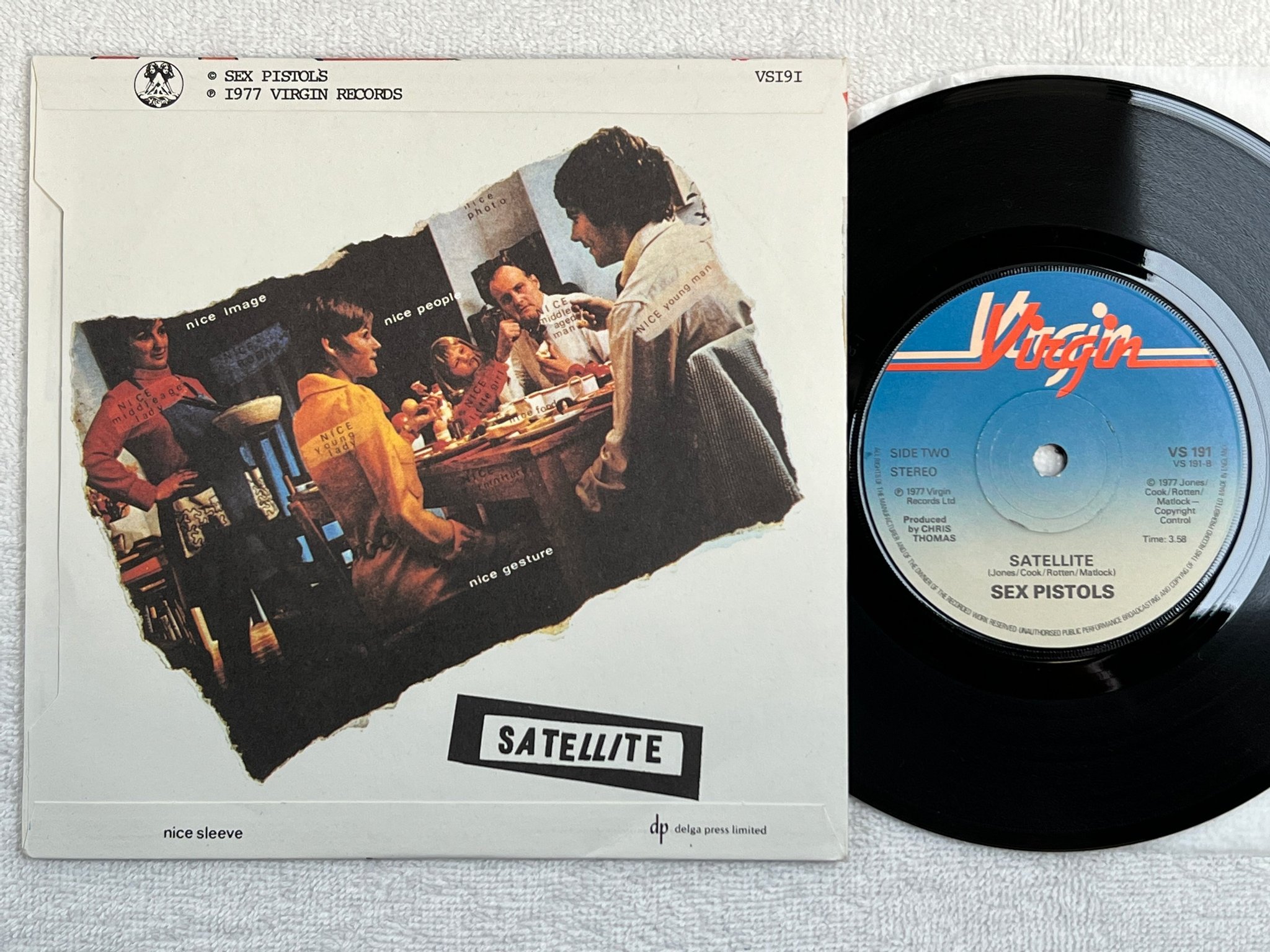 Omslagsbild för skivan SEX PISTOLS holidays in the sun 7"single -77 VS 191