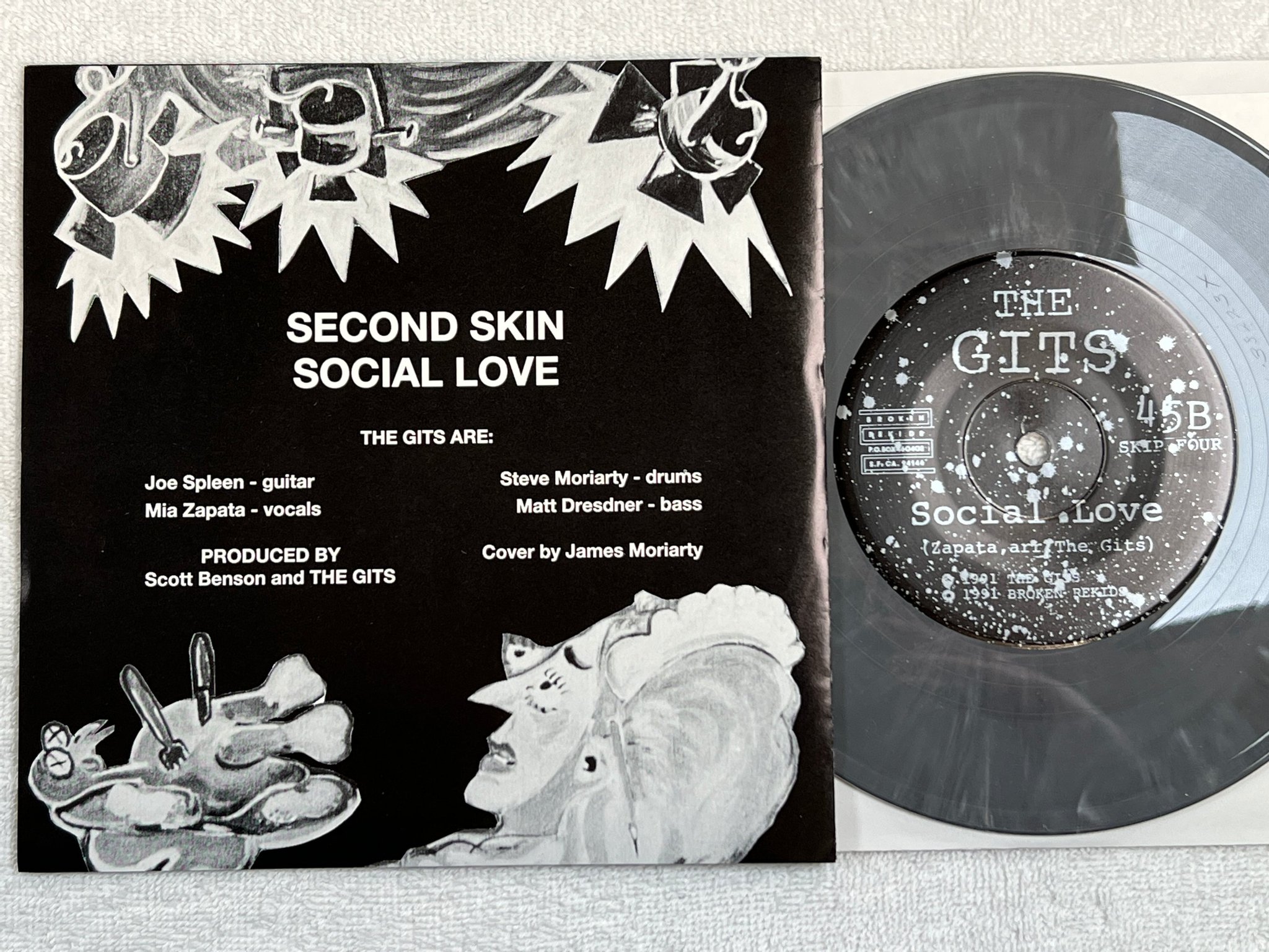 Omslagsbild för skivan THE GITS second skin 7"single -91 SKIP FOUR punk