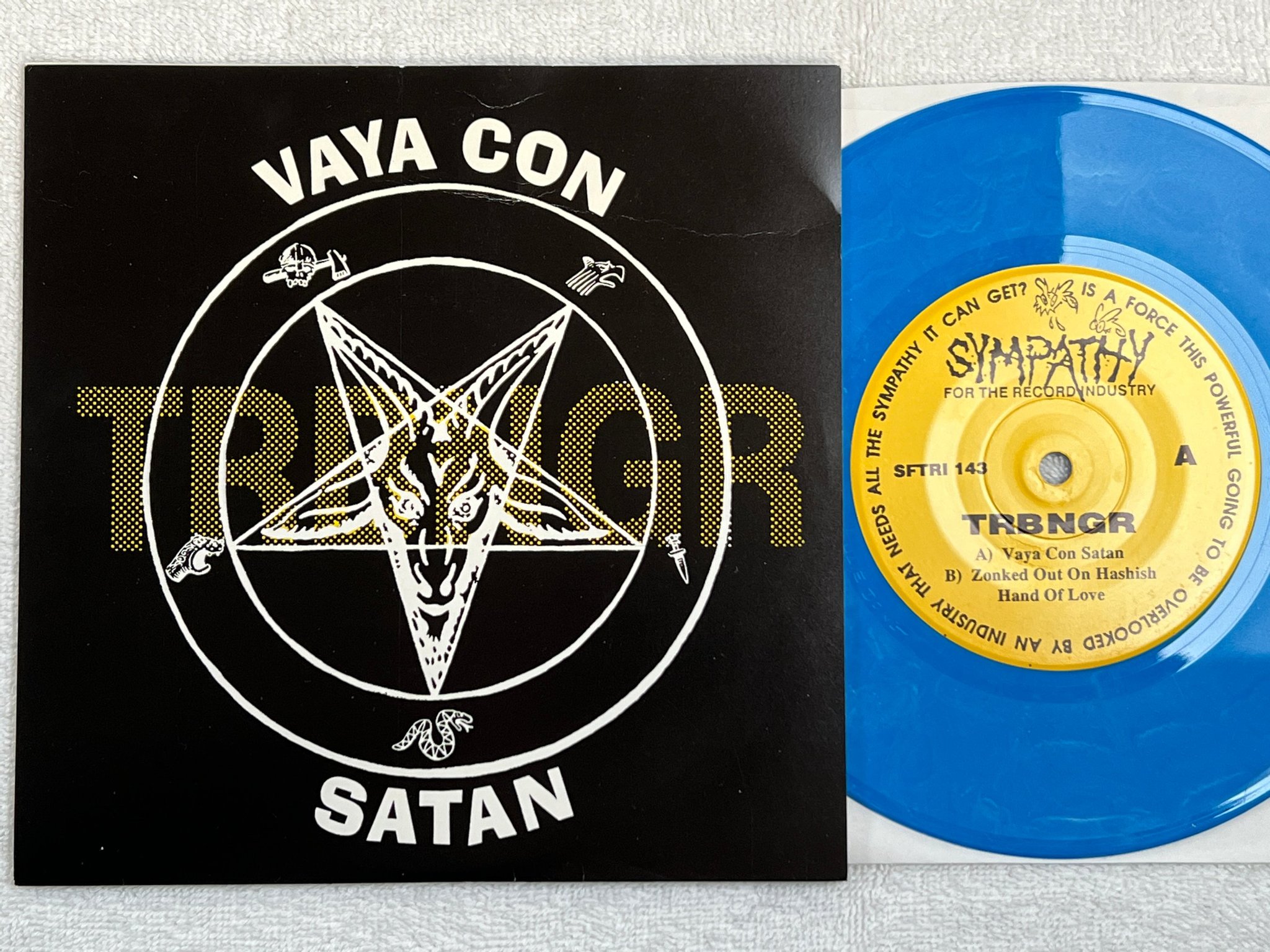 Omslagsbild för skivan TRBNGR vaya con satan 7"single -91 SFTRI 143