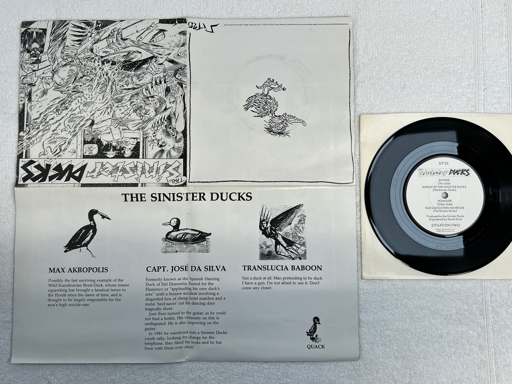 Omslagsbild för skivan SINISTER DUCKS march of the sinister ducks 7"single -83 SIT 25