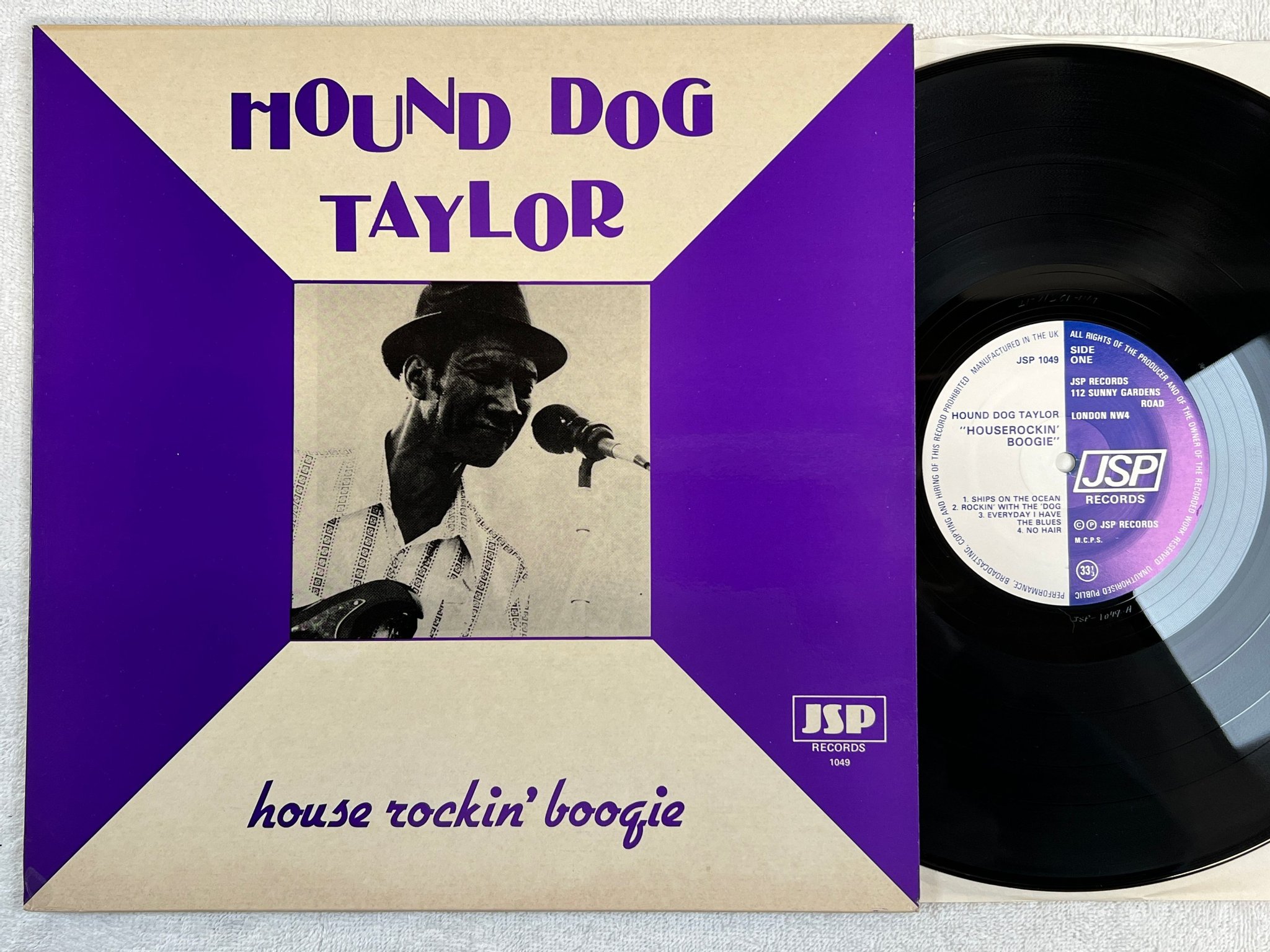 Omslagsbild för skivan HOUND DOG TAYLOR houserockin' boogie LP -82 UK JSP 1049