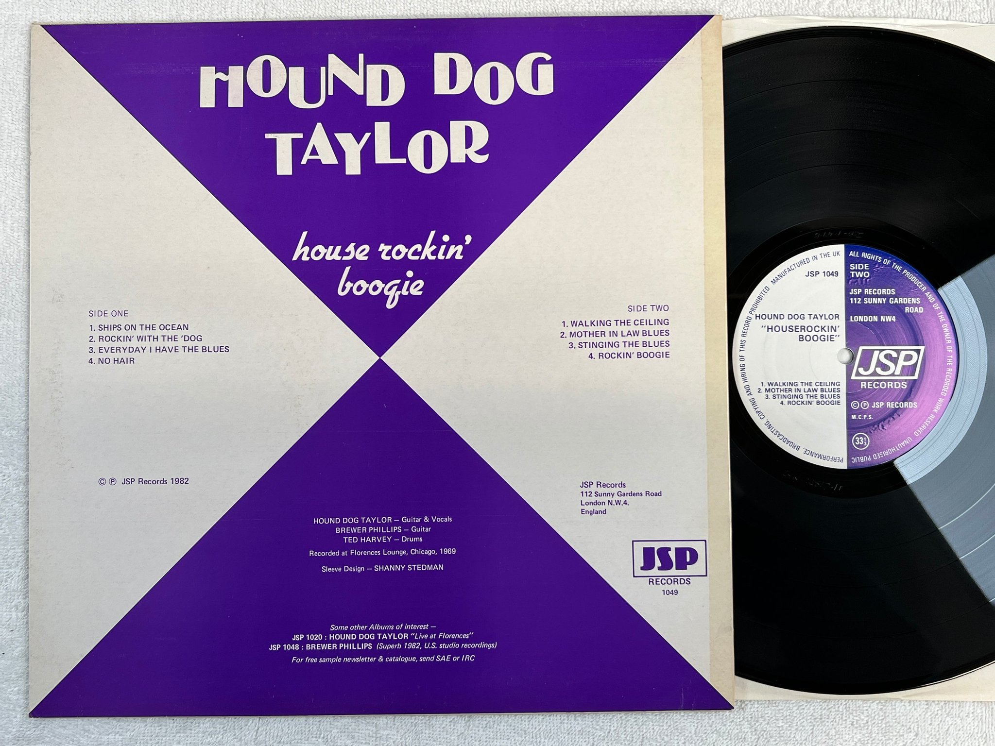 Omslagsbild för skivan HOUND DOG TAYLOR houserockin' boogie LP -82 UK JSP 1049