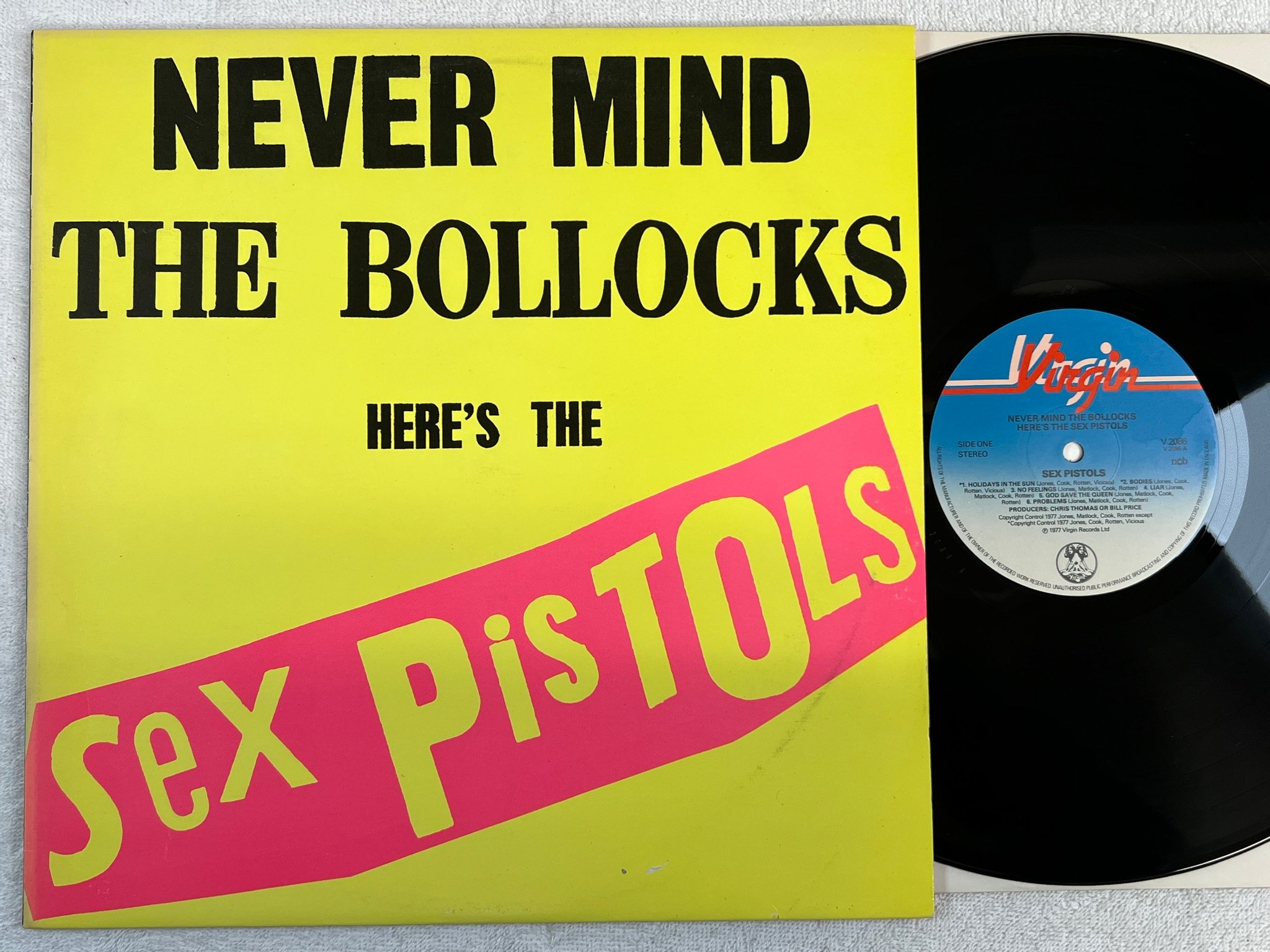 Omslagsbild för skivan SEX PISTOLS never mind the bollocks LP -77 Swe VIRGIN V2086 