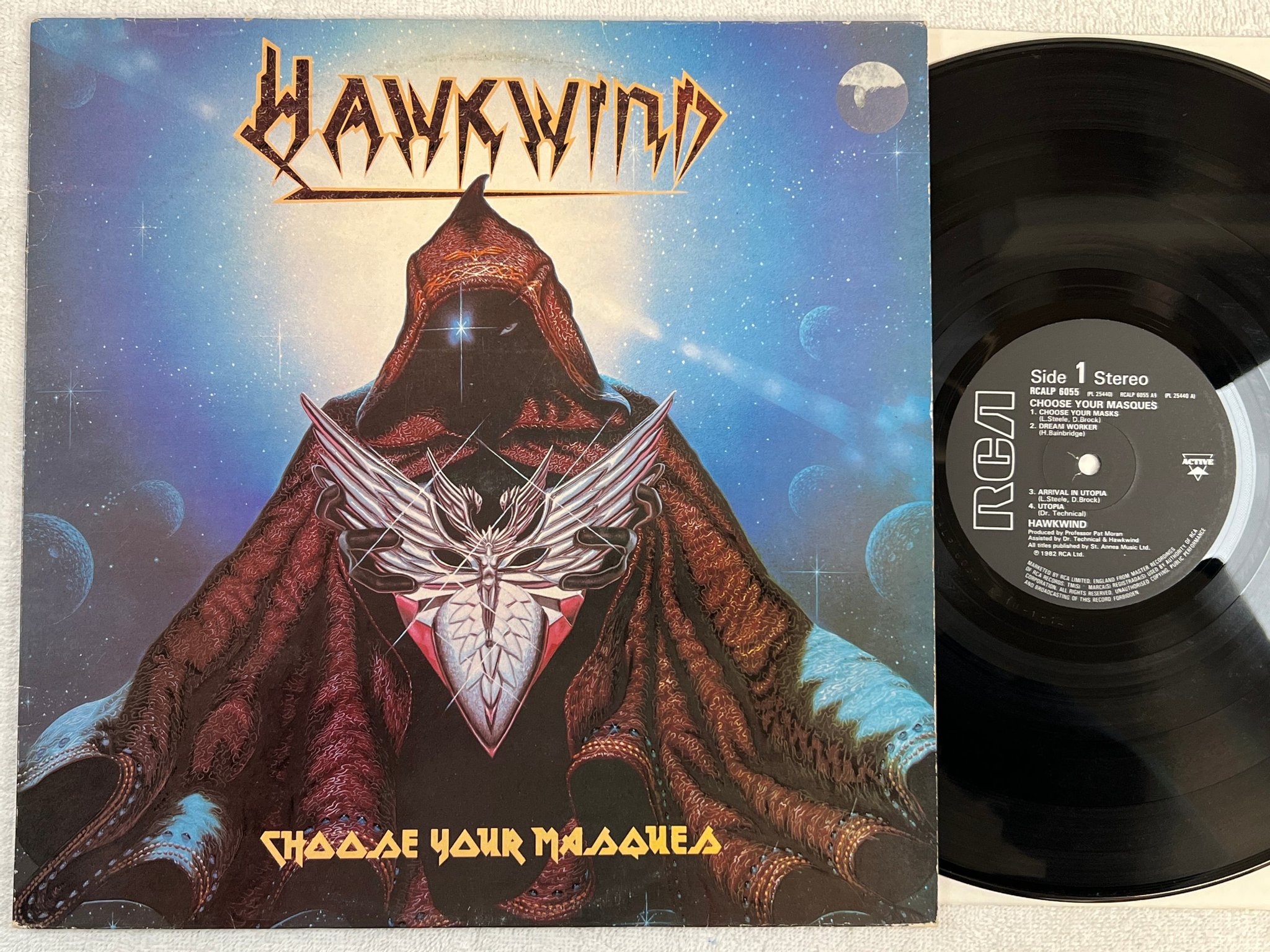 Omslagsbild för skivan HAWKWIND choose your masques LP -82 UK RCA RCALP 6055 space rock