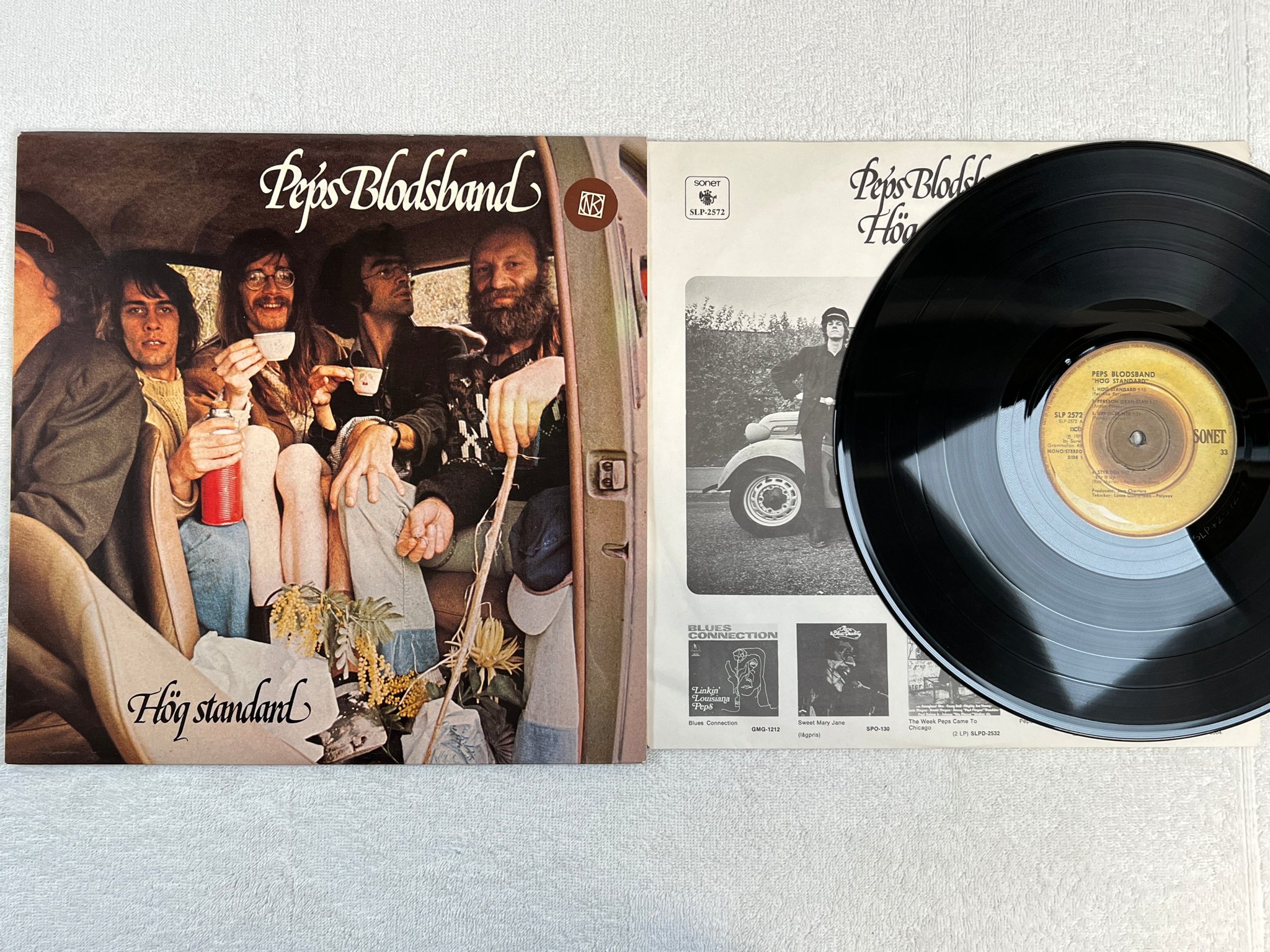 Omslagsbild för skivan PEPS BLODSBAND hög standard LP Swe SONET SLP 2572 " HÖG STANDARD "