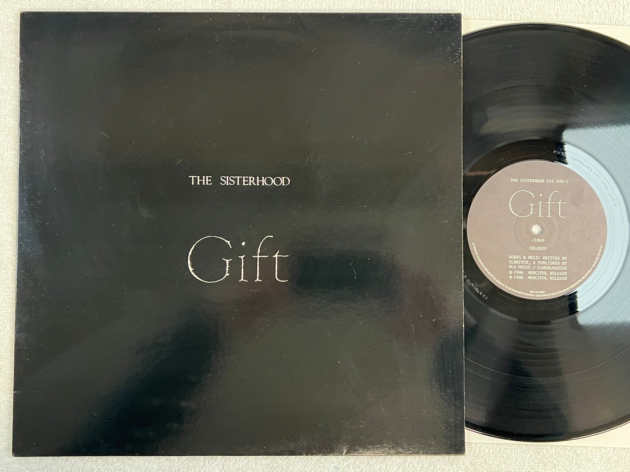Omslagsbild för skivan THE SISTERHOOD Gift LP -86 MERCIFUL RELEASE SIS 020 SYNTH & GOTH