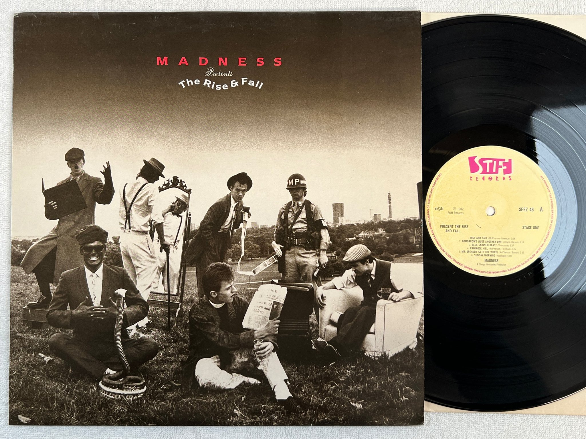 Omslagsbild för skivan MADNESS present the rise and fall LP -82 ncb STIFF SEEZ 46