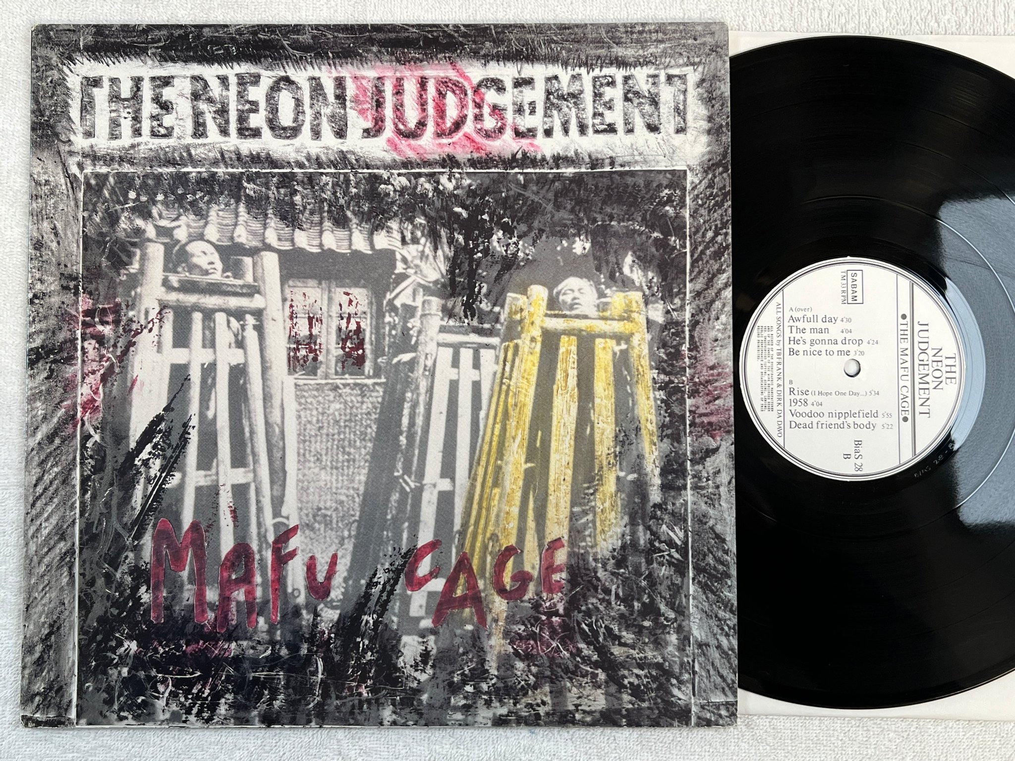 Omslagsbild för skivan THE NEON JUDGEMENT the mafu cage LP -86 Belgium BiaS 28