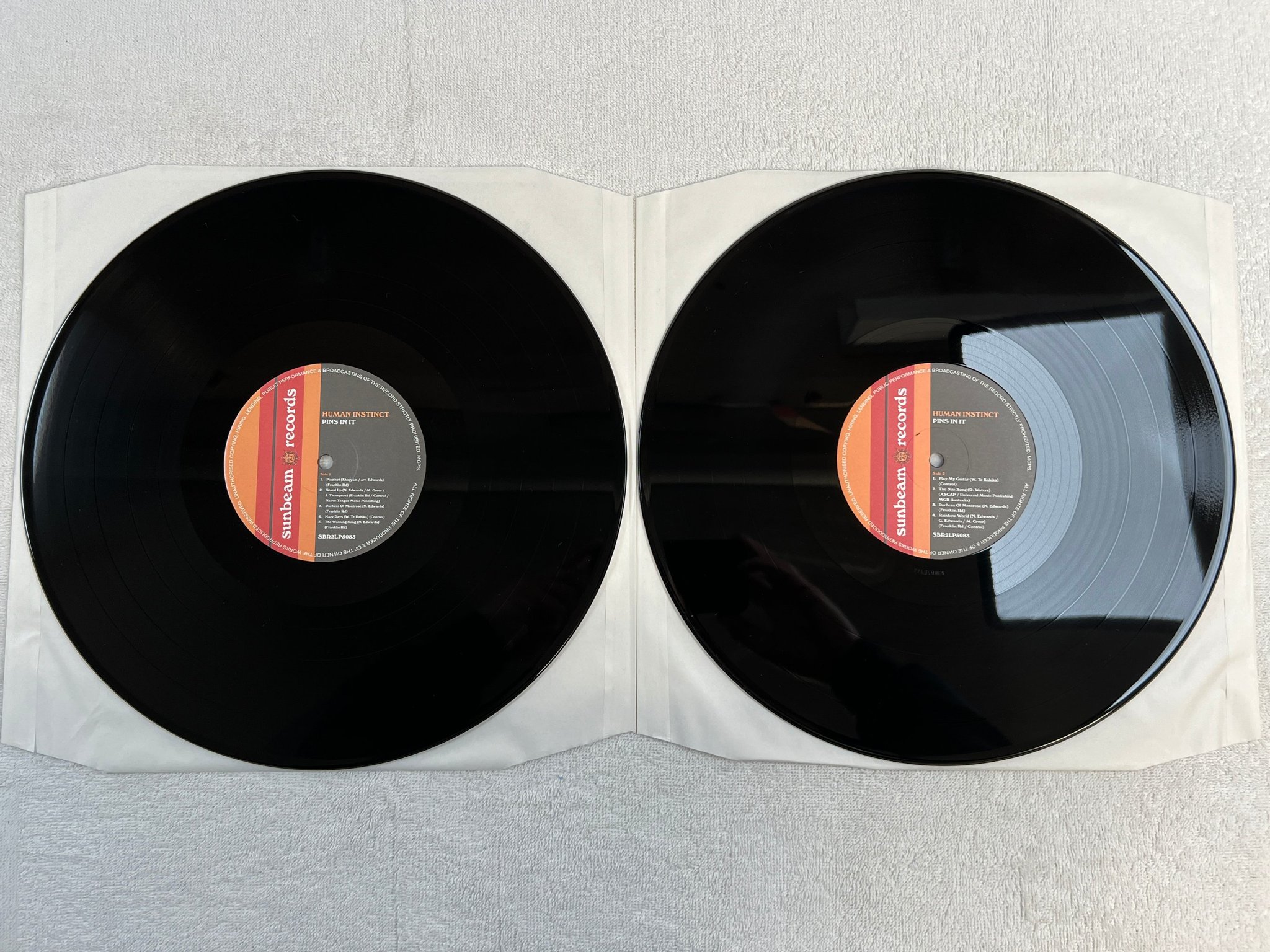 Omslagsbild för skivan HUMAN INSTINCT Pins In It 2xLP 2011 UK SUNBEAM SBR2LP5083 hard rock