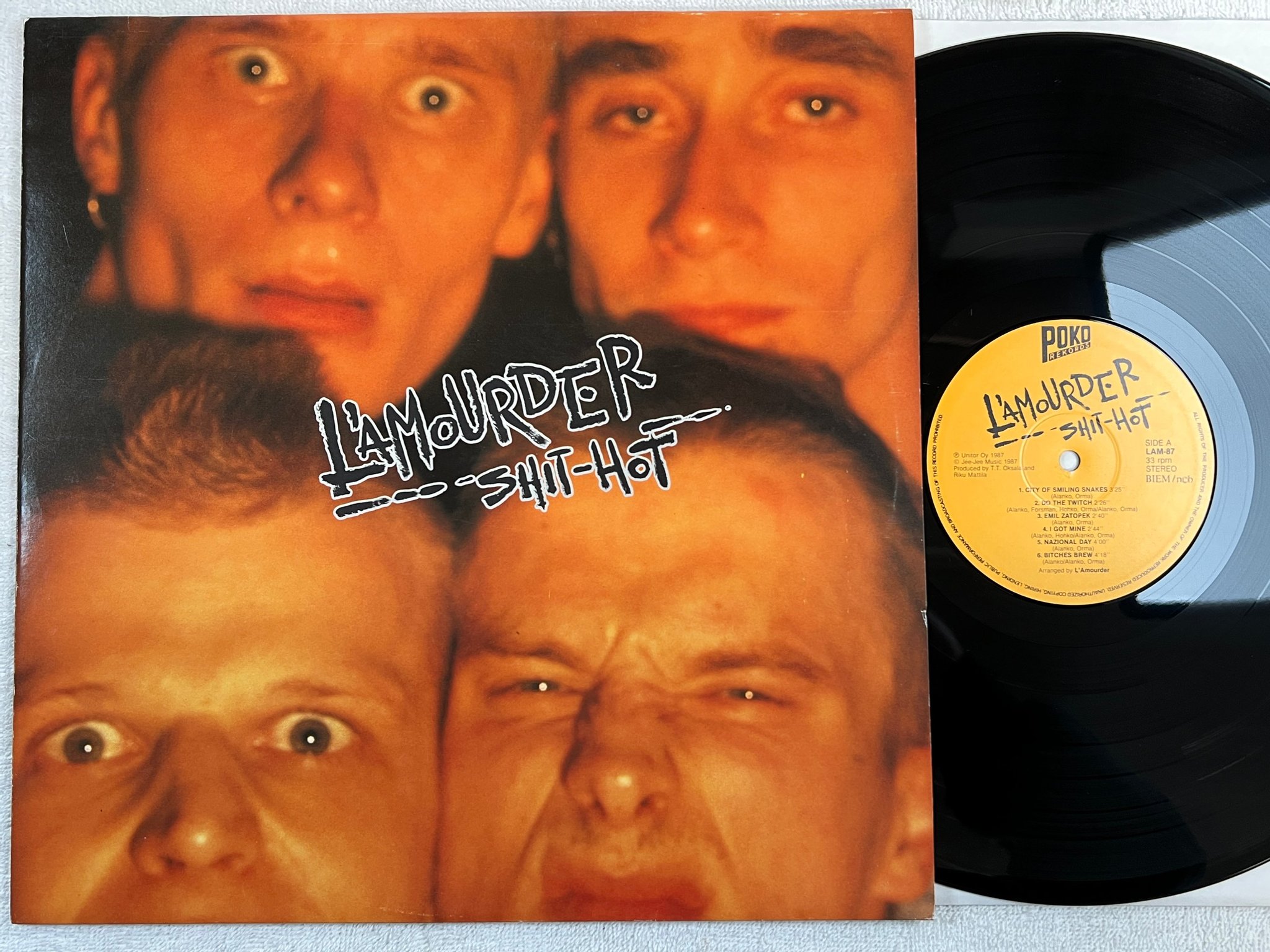 Omslagsbild för skivan L'AMOURDER shit hot LP -87 ncb POKO REKORDS LAM-87 
