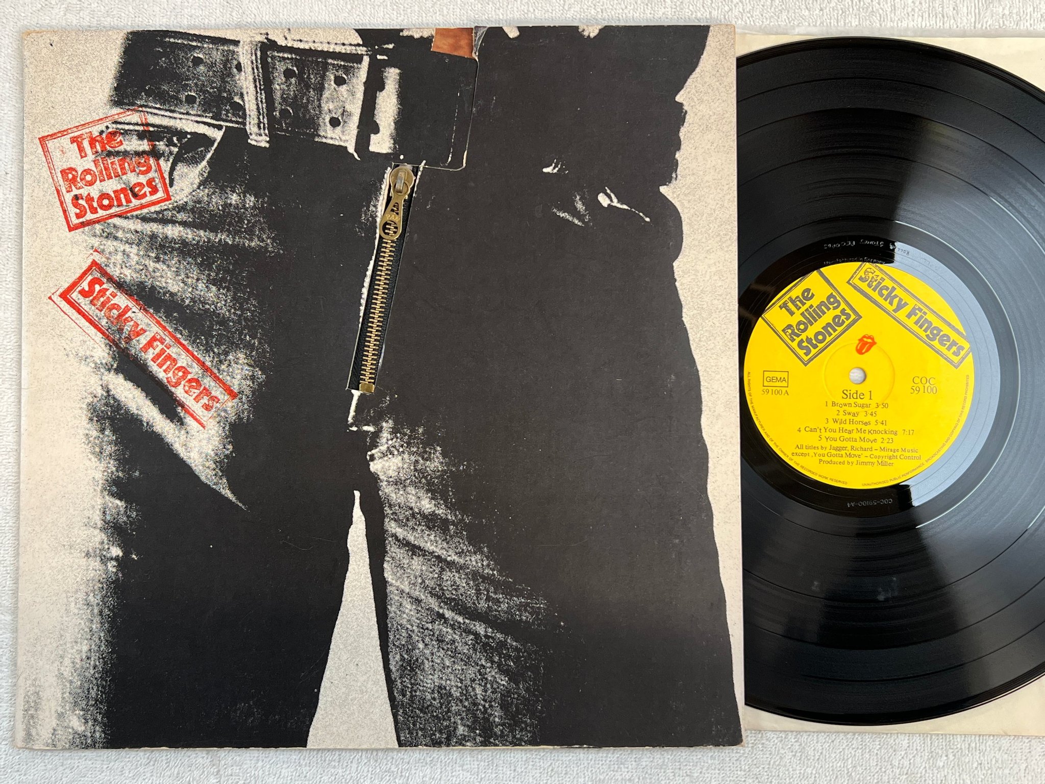 Omslagsbild för skivan THE ROLLING STONES sticky fingers LP Ger COC 59100 Andy Warhol cover art ZIPPER 