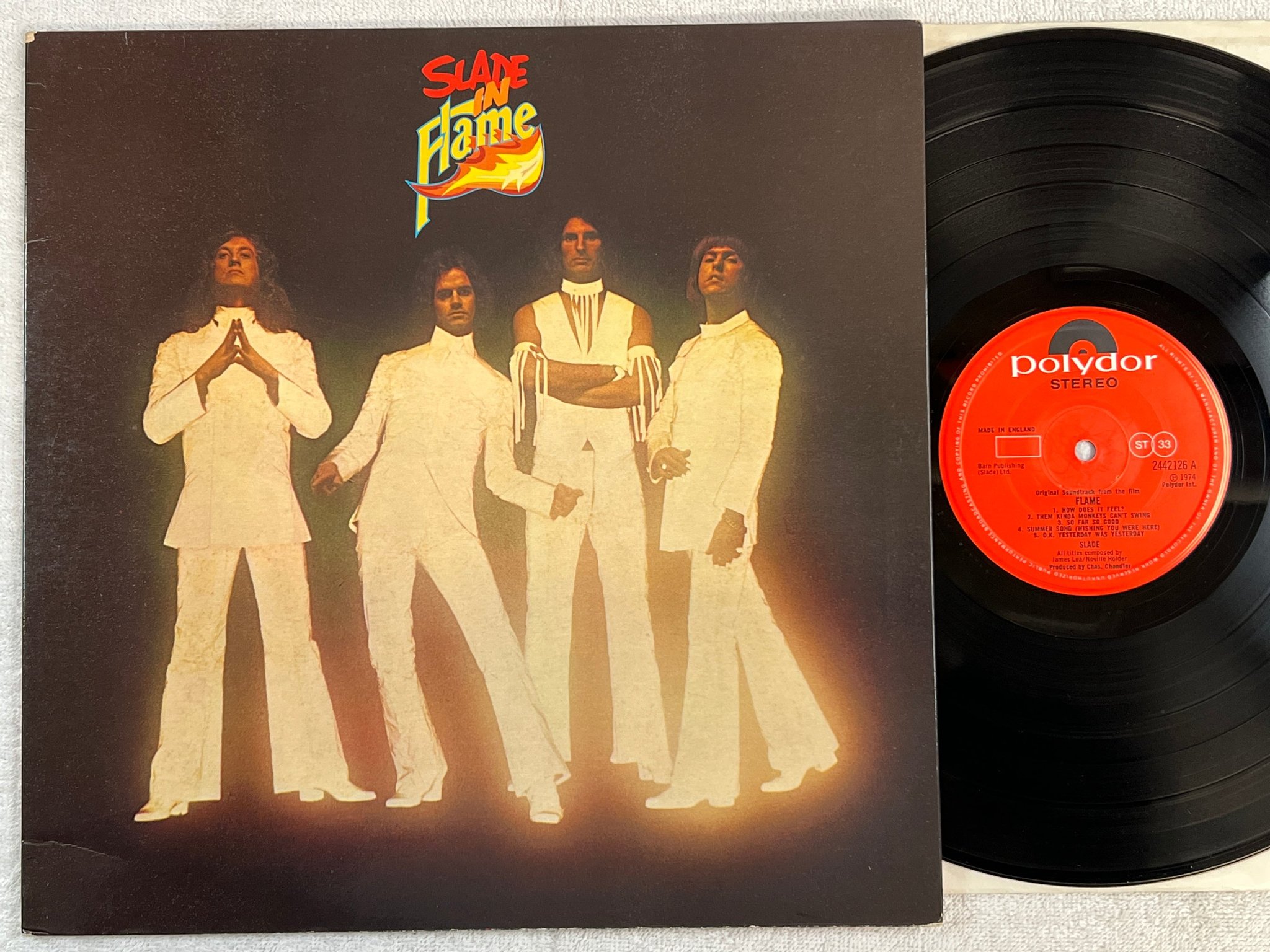 Omslagsbild för skivan SLADE flame LP -74 UK POLYDOR 2442126