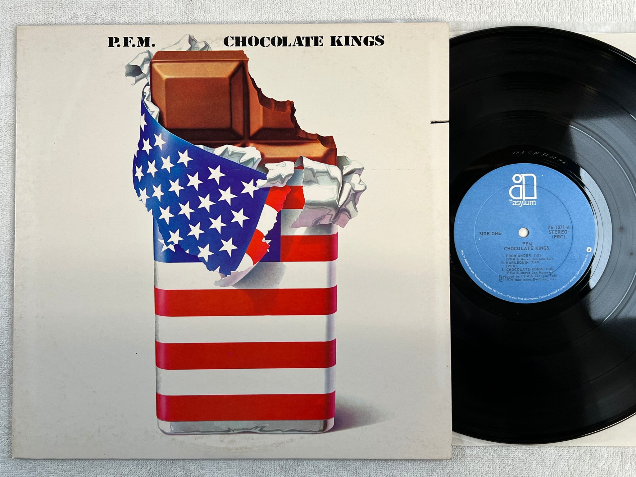 Omslagsbild för skivan PFM chocolate kings LP -76 US ASYLUM 7E-1071