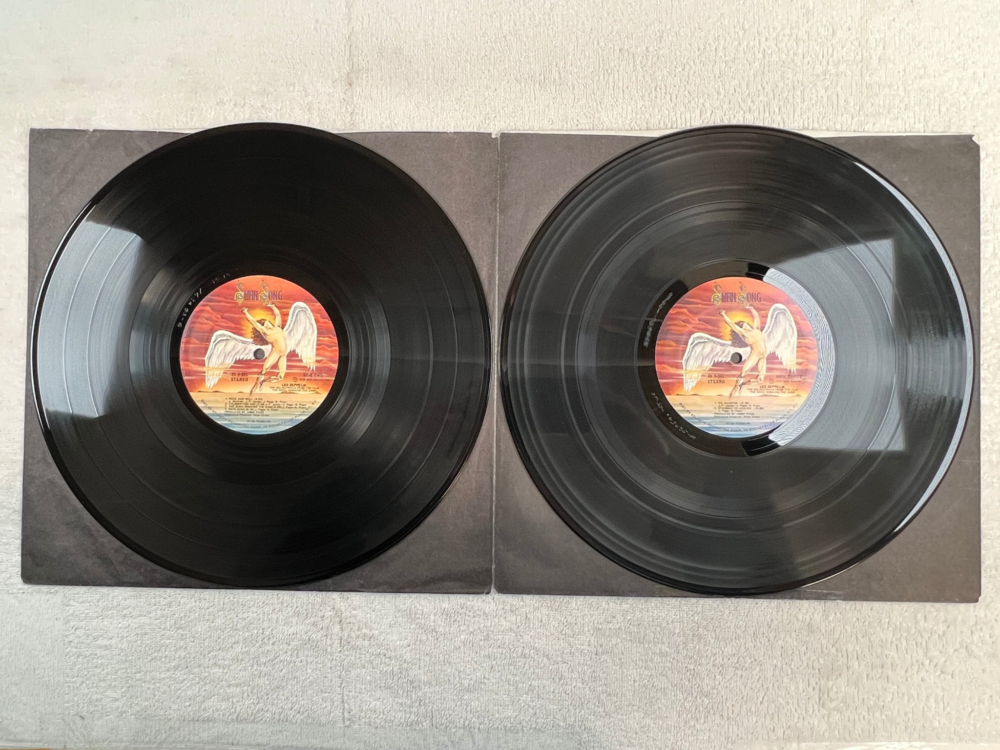 Omslagsbild för skivan LED ZEPPELIN the song remains the same LP -76 US SWAN SONG SS 2-201