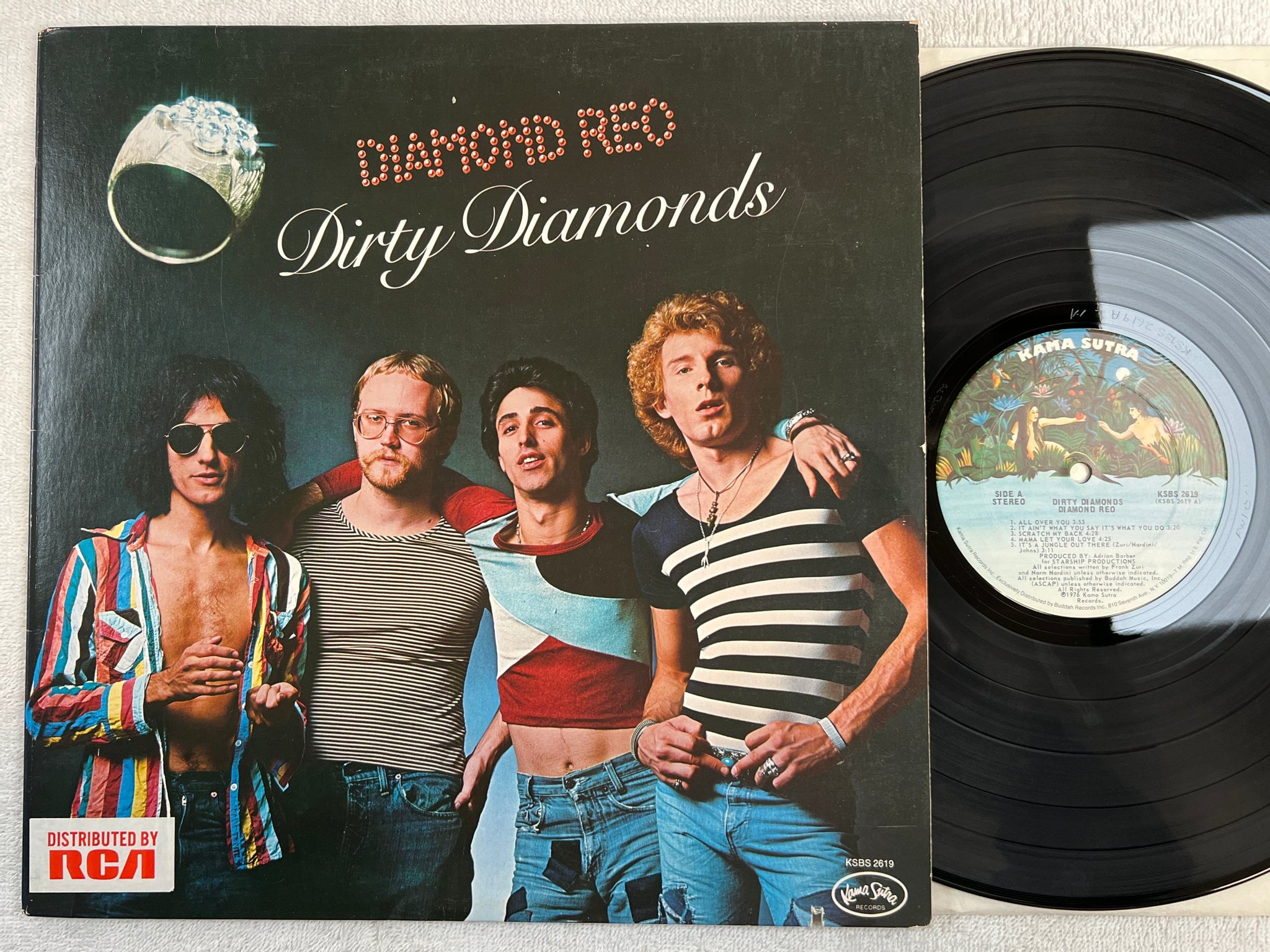 Omslagsbild för skivan DIAMOND REO Dirty Diamonds LP -76 US KAMA SUTRA KSBS 2619 