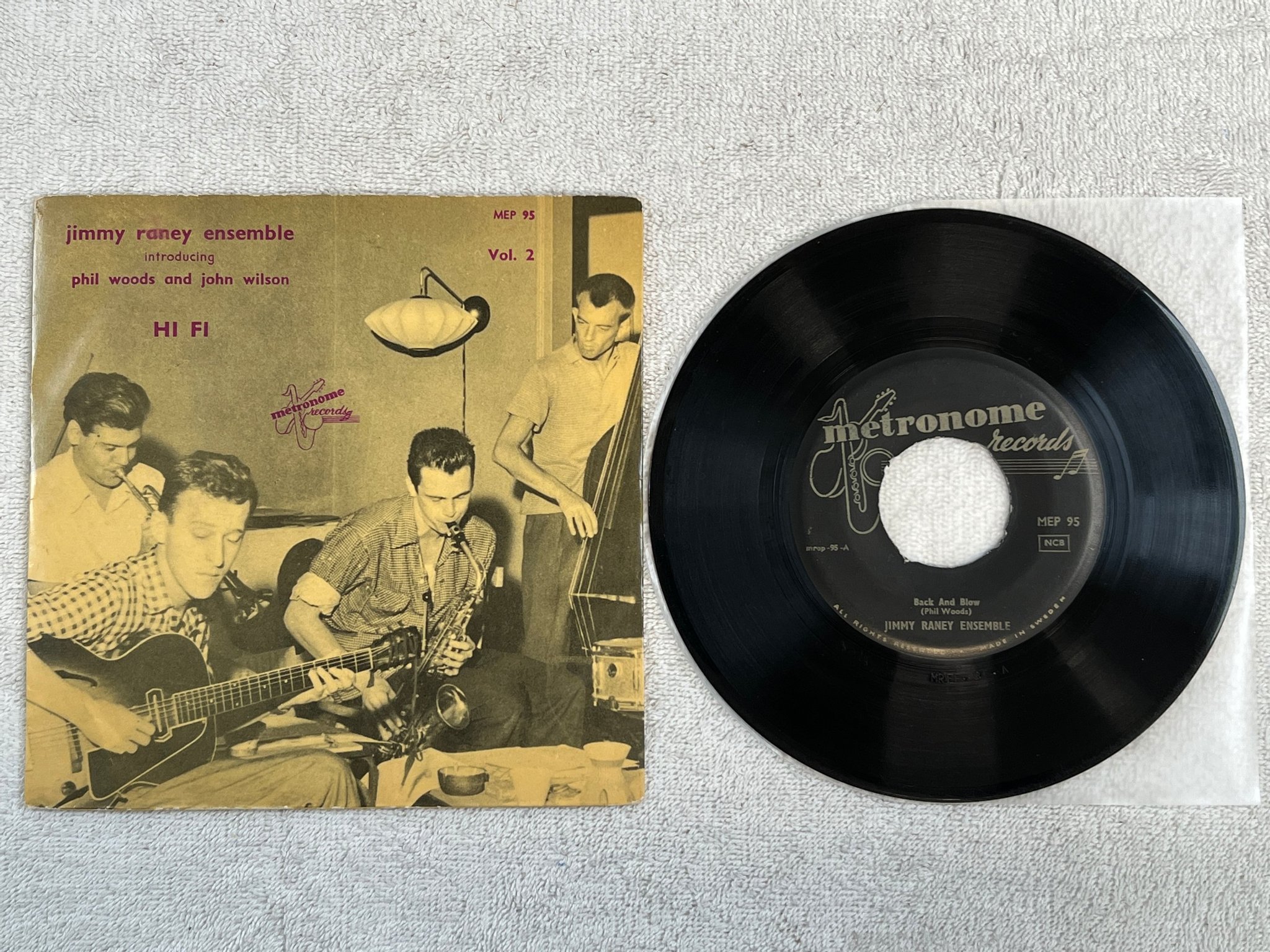 Omslagsbild för skivan JIMMY RAINEY ENSEMBLE back and blow 7"single -55 ncb METRONOME MEP 95