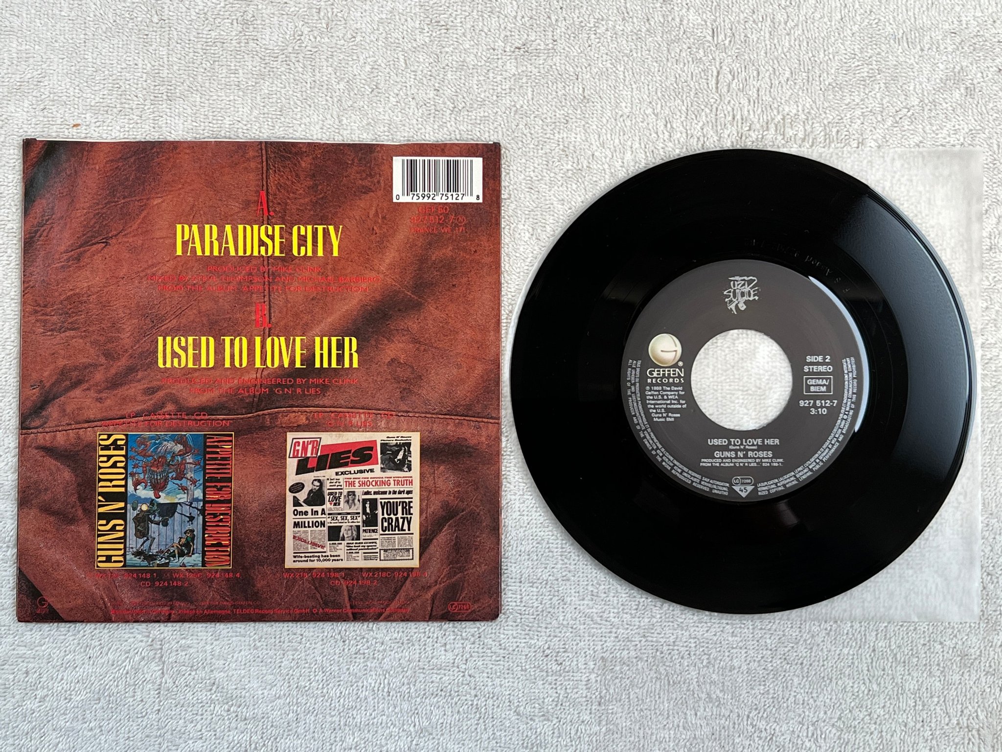 Omslagsbild för skivan GUNS N' ROSES paradise city 7"single -87 GEFFEN 927512-7