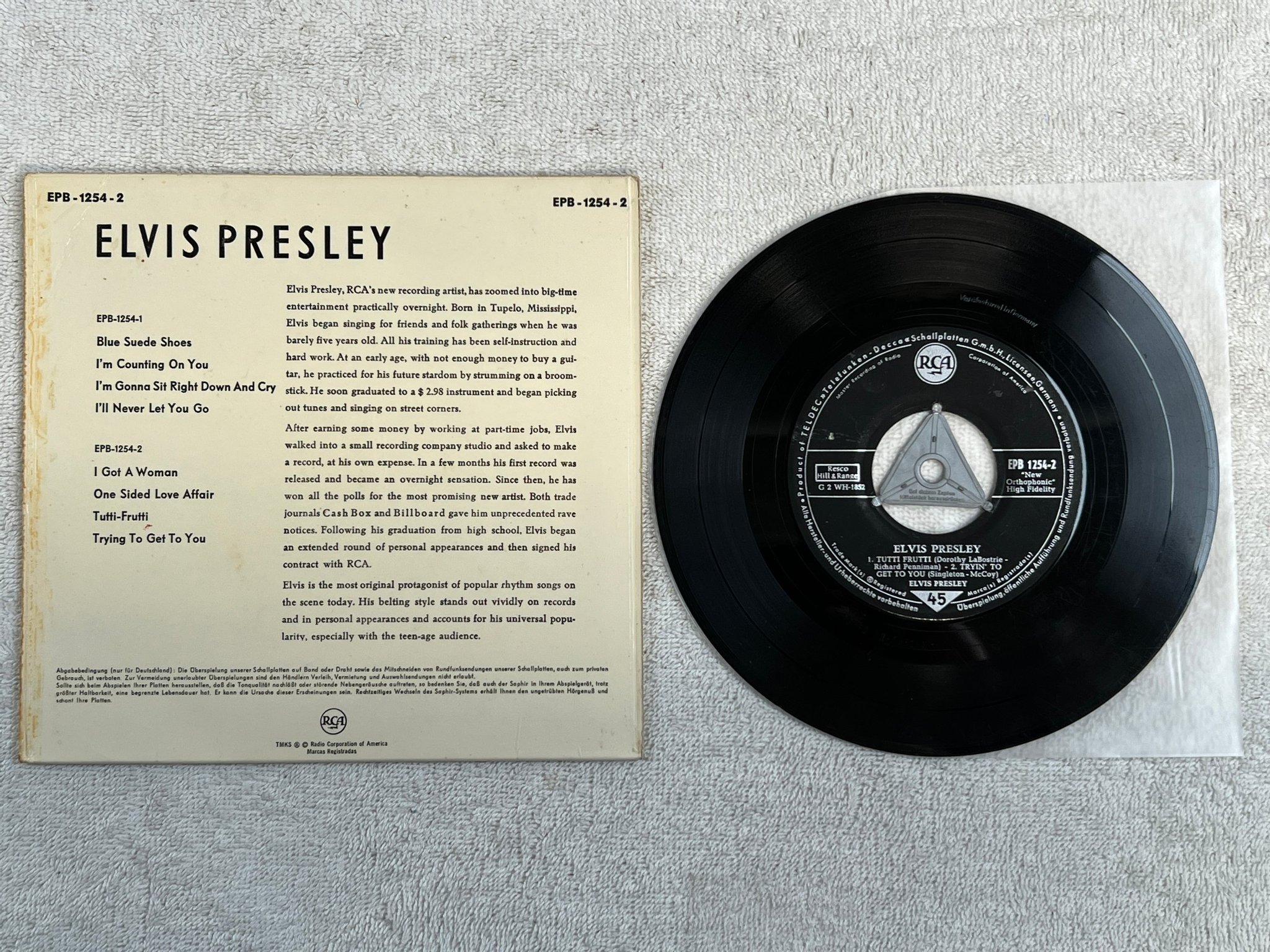 Omslagsbild för skivan ELVIS PRESLEY 7"ep Ger RCA EPB 1254-2 top opening ICONIC COVER