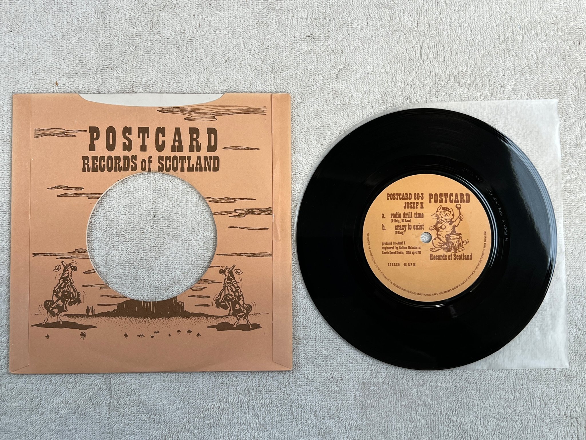 Omslagsbild för skivan JOSEF K Radio Drill Time 7"single -80 POSTCARD 80 3  new wave