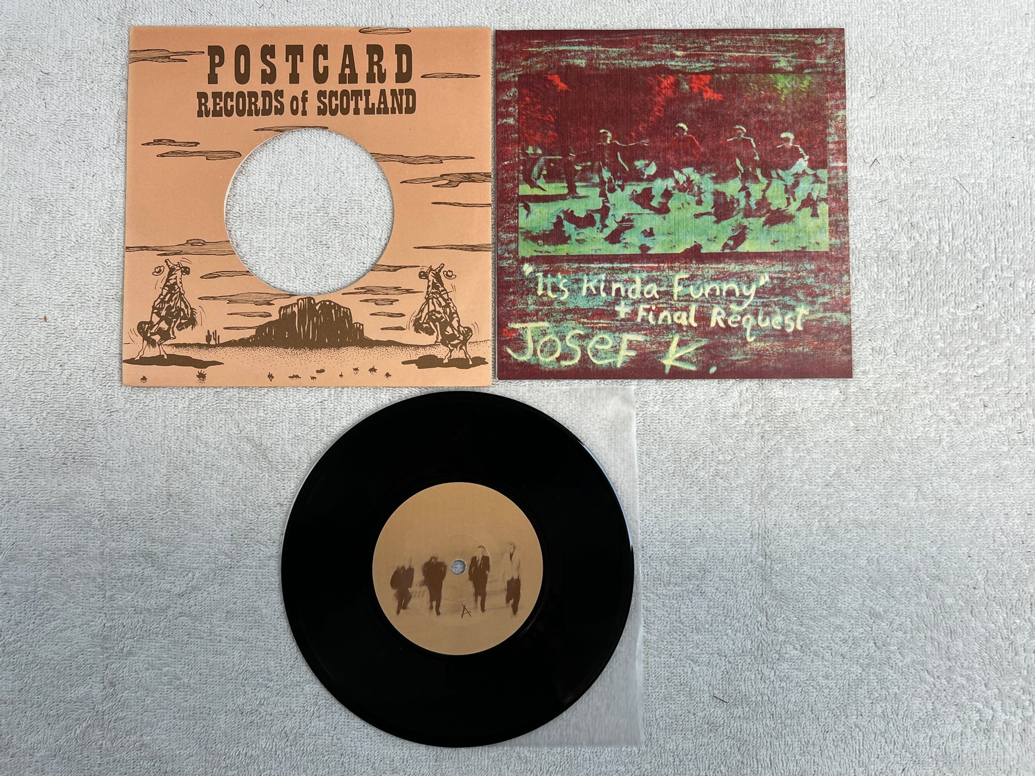 Omslagsbild för skivan JOSEF K It's Kinda Funny 7"single -80 POSTCARD 80 5  new wave