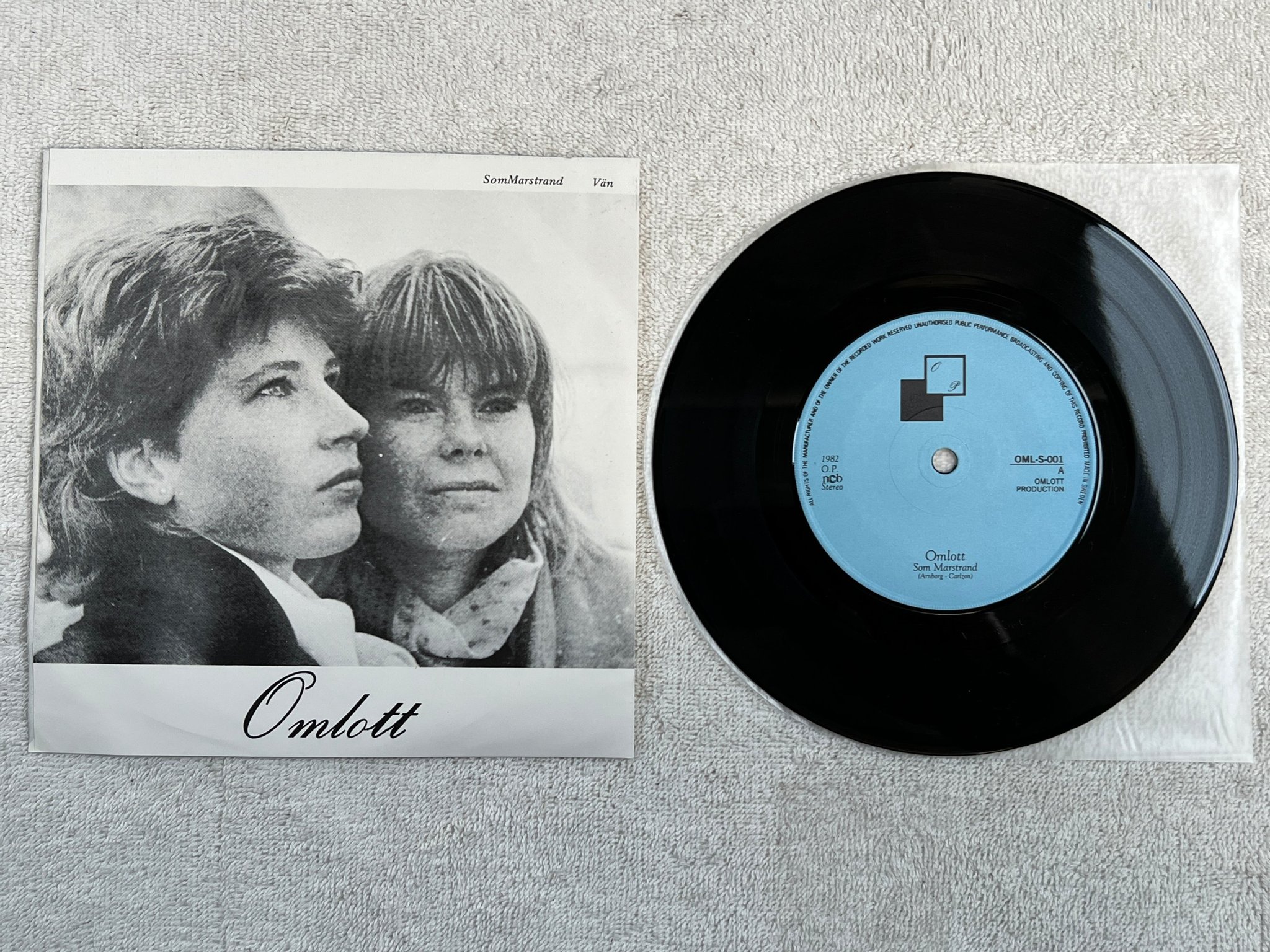 Omslagsbild för skivan OMLOTT Som Marstrand 7"single -82 Swe O.P. OML-S001