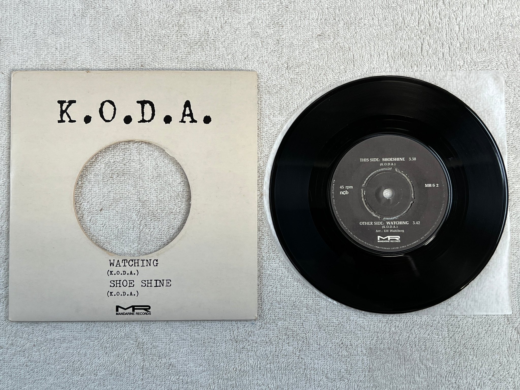Omslagsbild för skivan K.O.D.A. watching 7"single -79 Swe MANDARINE MR-S 2