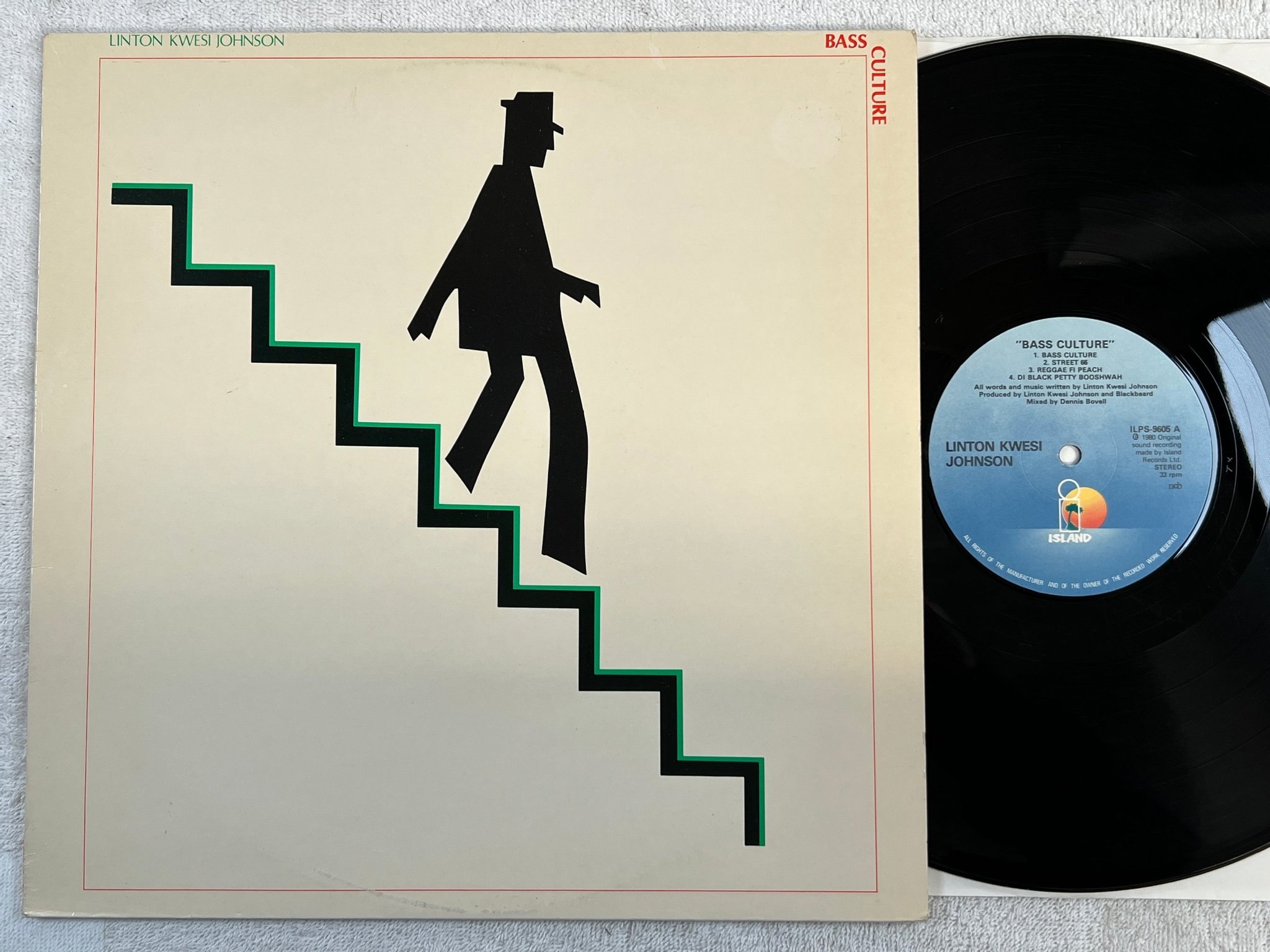 Omslagsbild för skivan LINTON KWESI JOHNSON bass culture LP -80 ncb ISLAND ILPS 9605