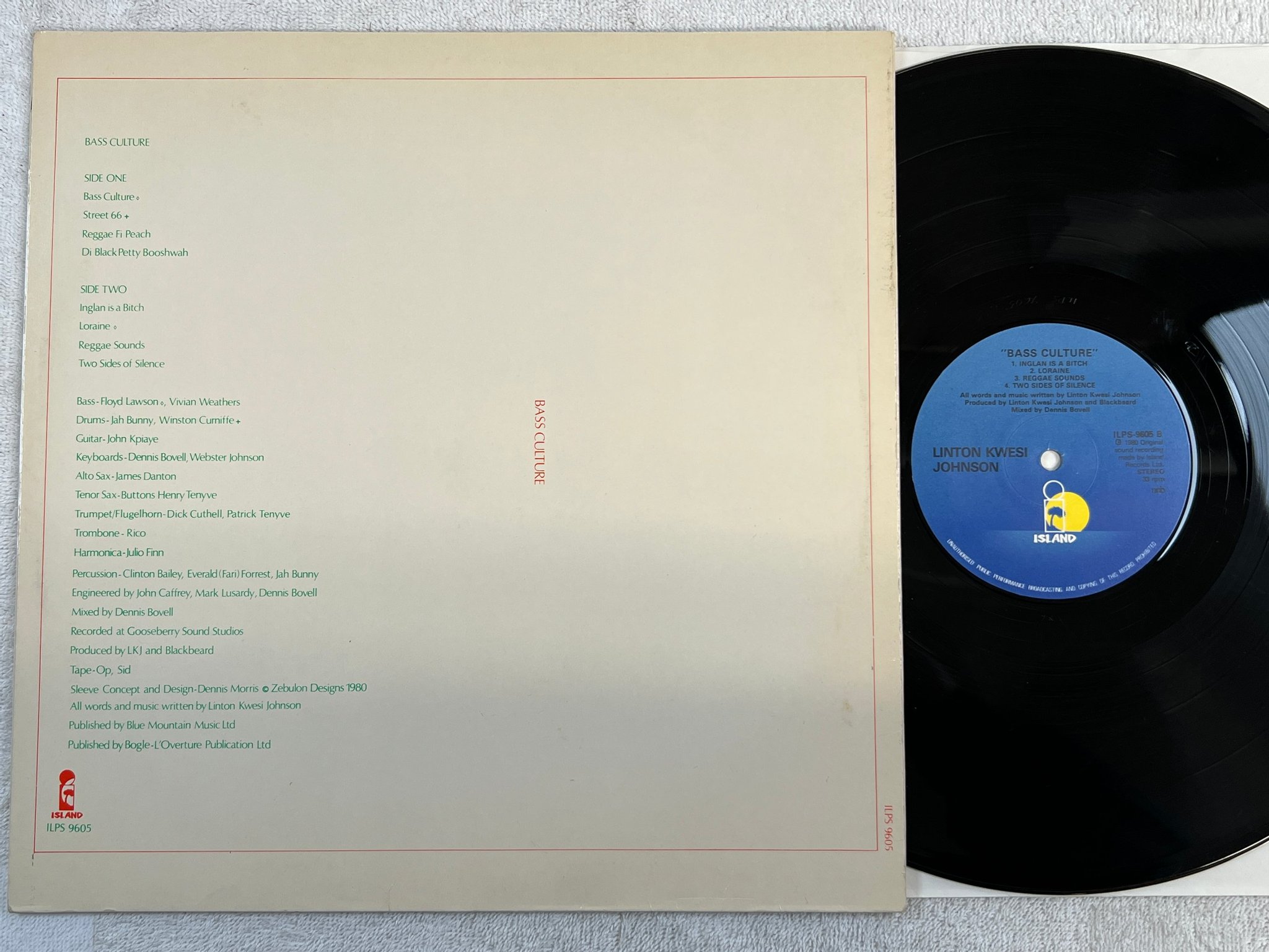 Omslagsbild för skivan LINTON KWESI JOHNSON bass culture LP -80 ncb ISLAND ILPS 9605