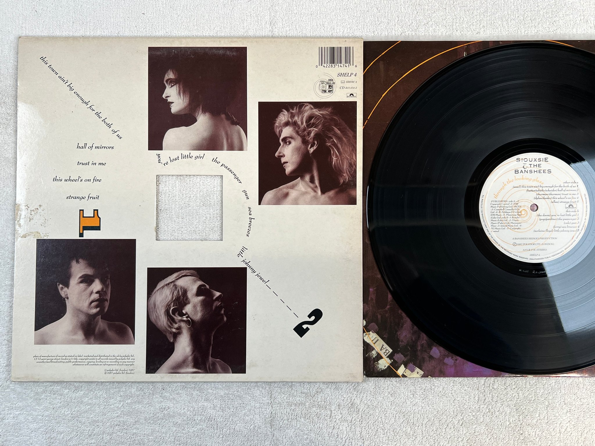 Omslagsbild för skivan SIOUXSIE & THE BANSHEES through the looking glass LP -87 POLYDOR SHELP 4