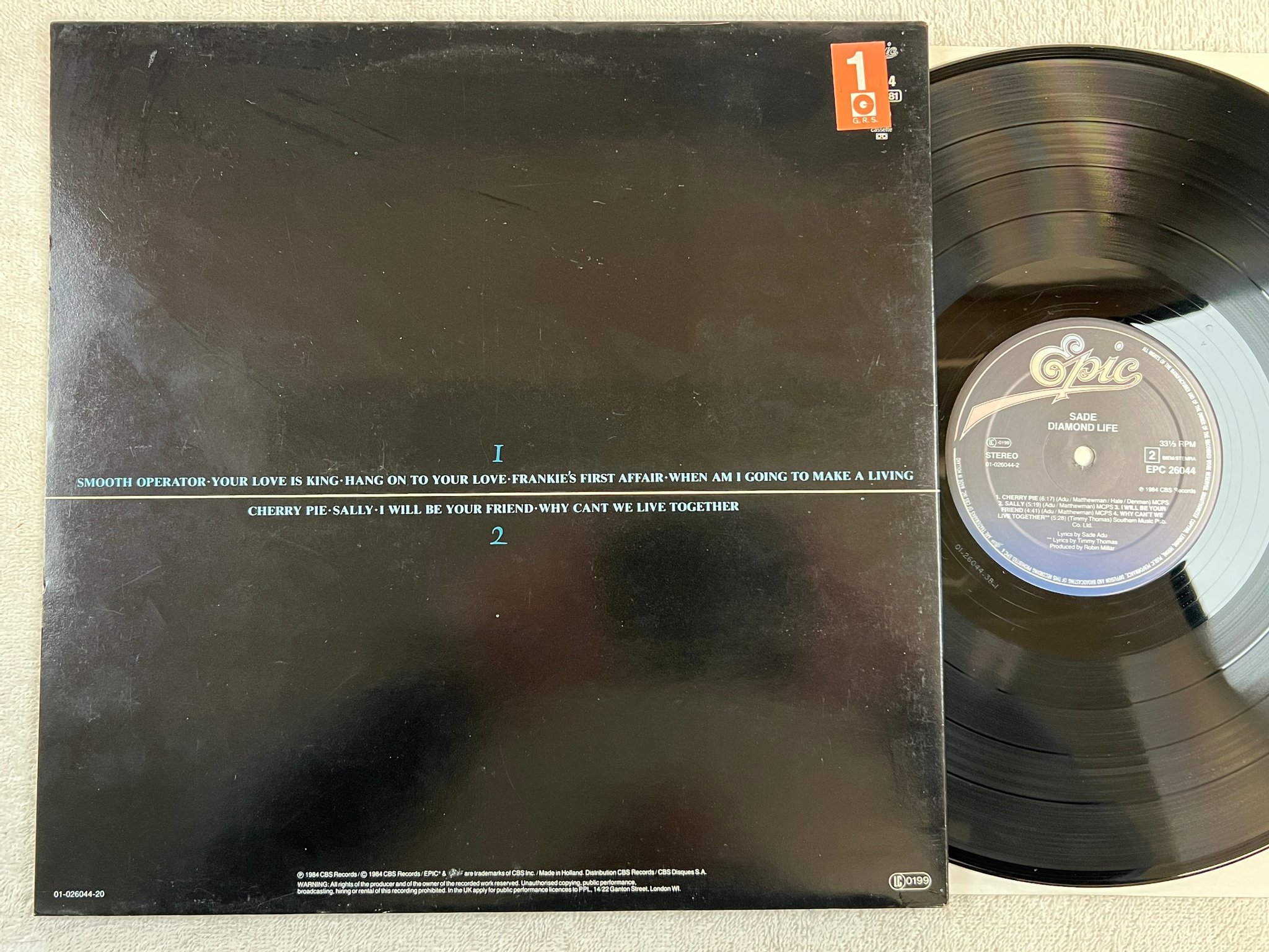 Omslagsbild för skivan SADE Diamond life LP -84 Hol EPIC EPC 26044