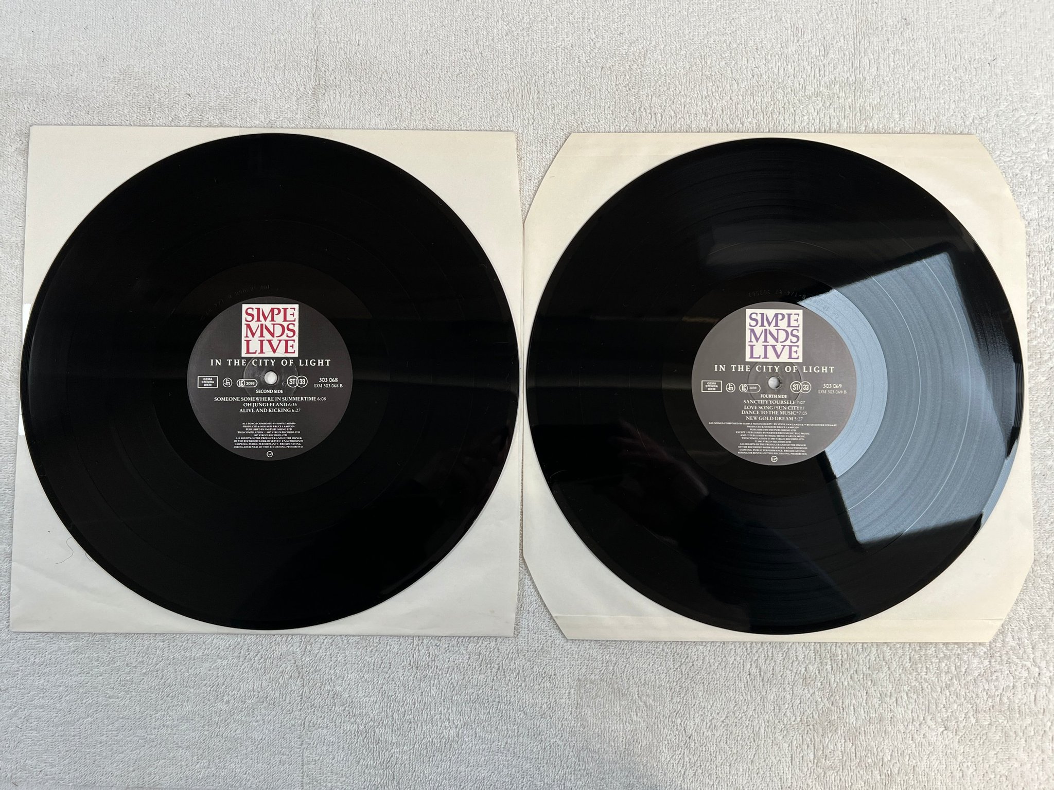 Omslagsbild för skivan SIMPLE MINDS in the city of light  ( live ) 2xLP -87 EMI 303069