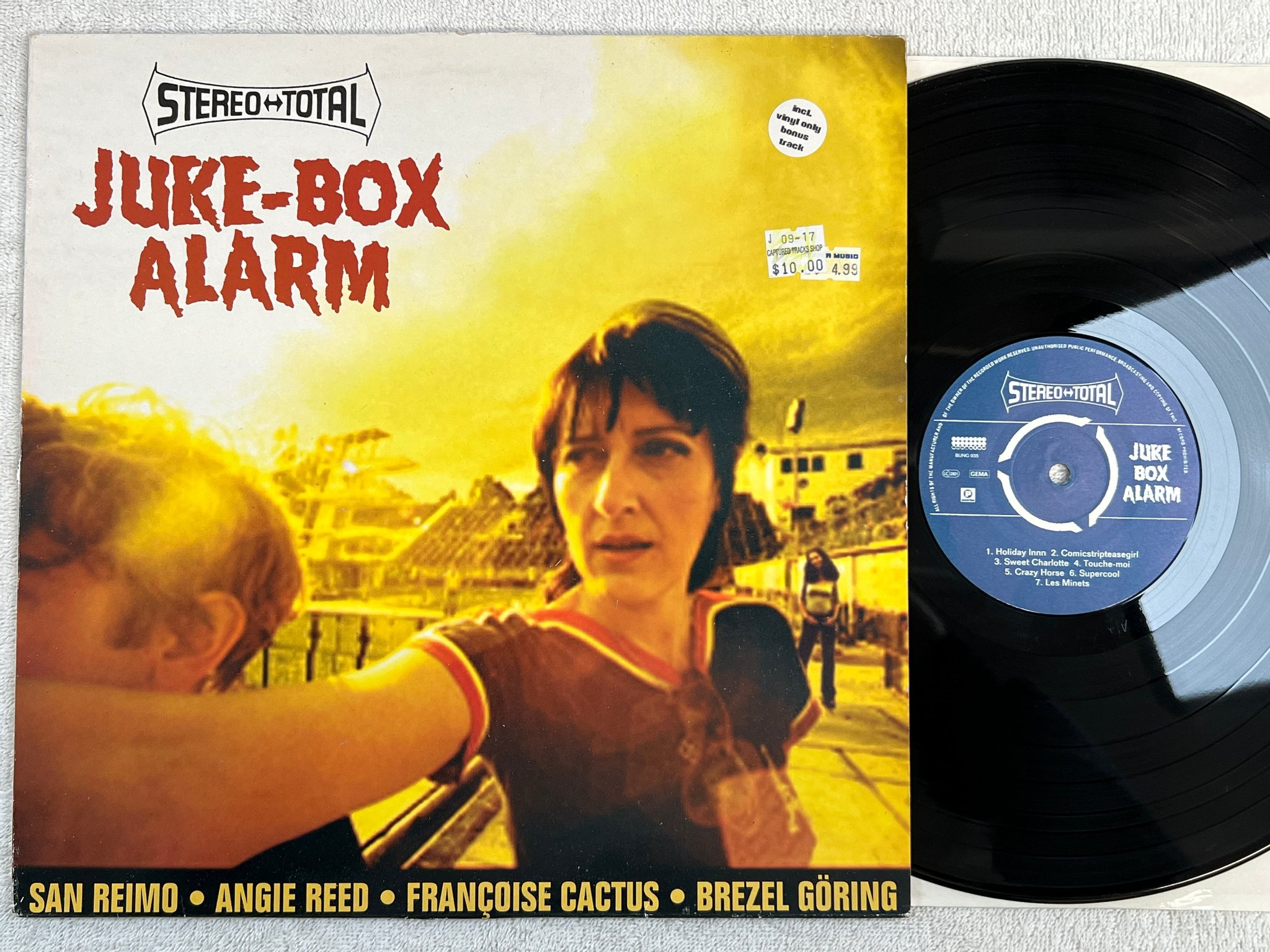 Omslagsbild för skivan STEREO TOTAL Juke-Box Alarm LP -98 Ger BUNGALOW BUNG 035