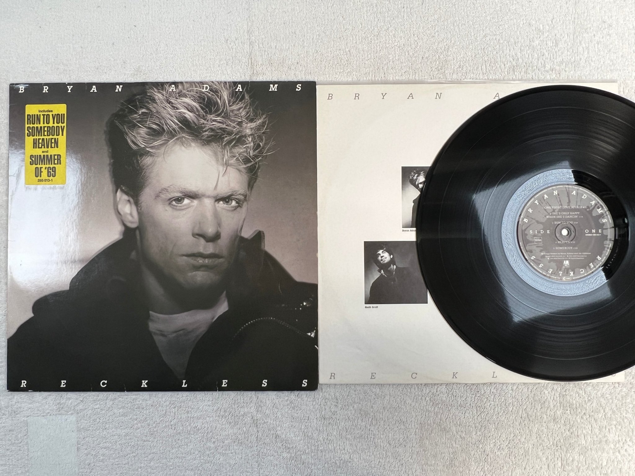 Omslagsbild för skivan BRYAN ADAMS reckless LP -83 Ger A&M 395013-1