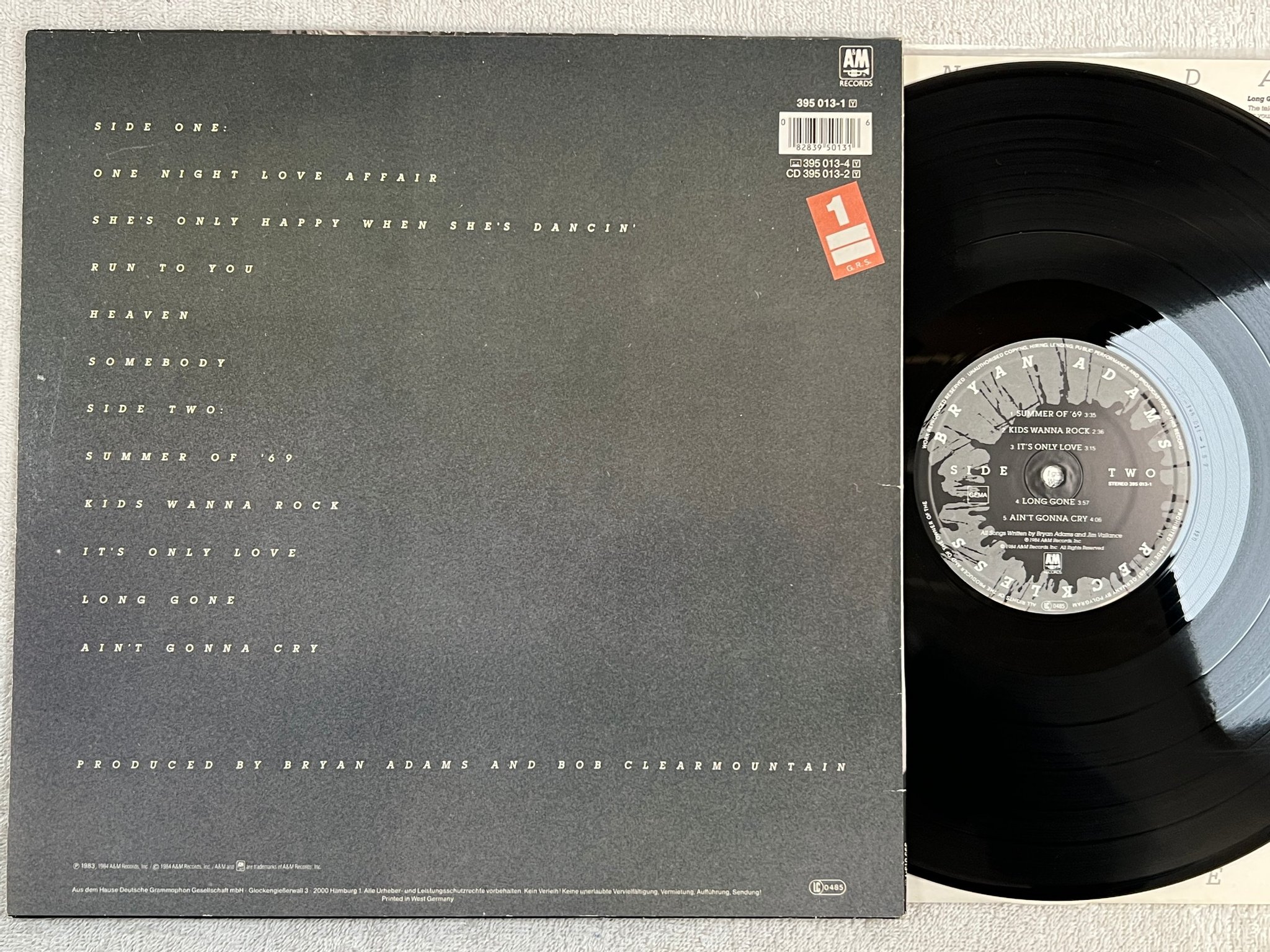 Omslagsbild för skivan BRYAN ADAMS reckless LP -83 Ger A&M 395013-1