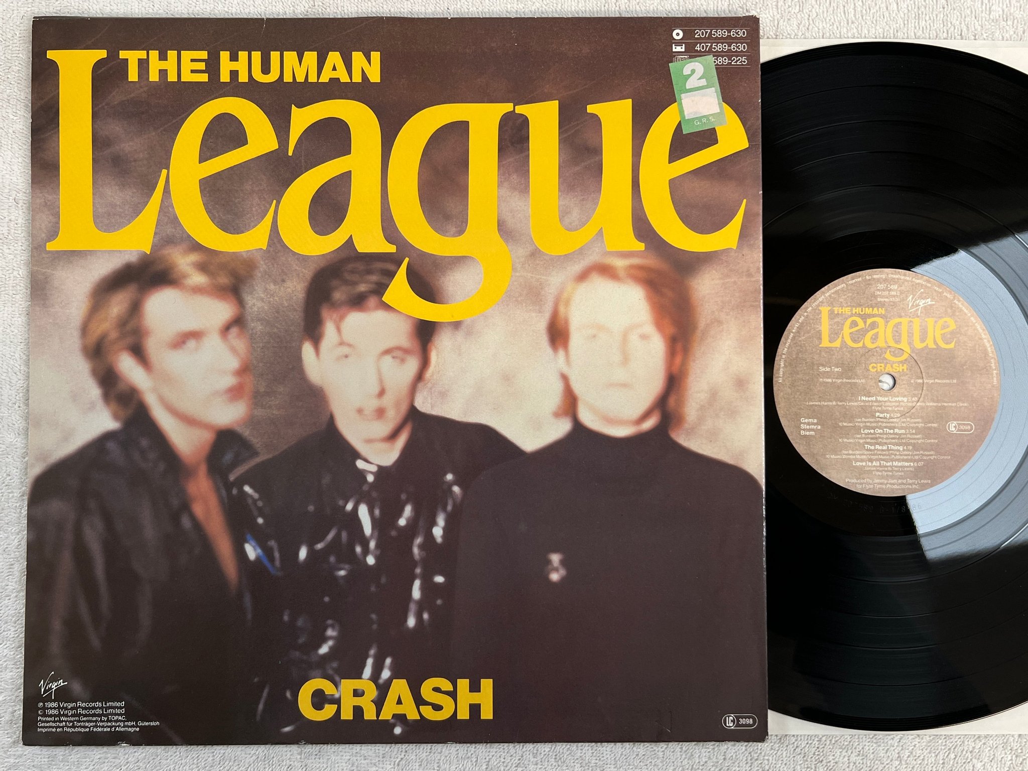 Omslagsbild för skivan THE HUMAN LEAGUE crash LP -86 VIRGIN 207589