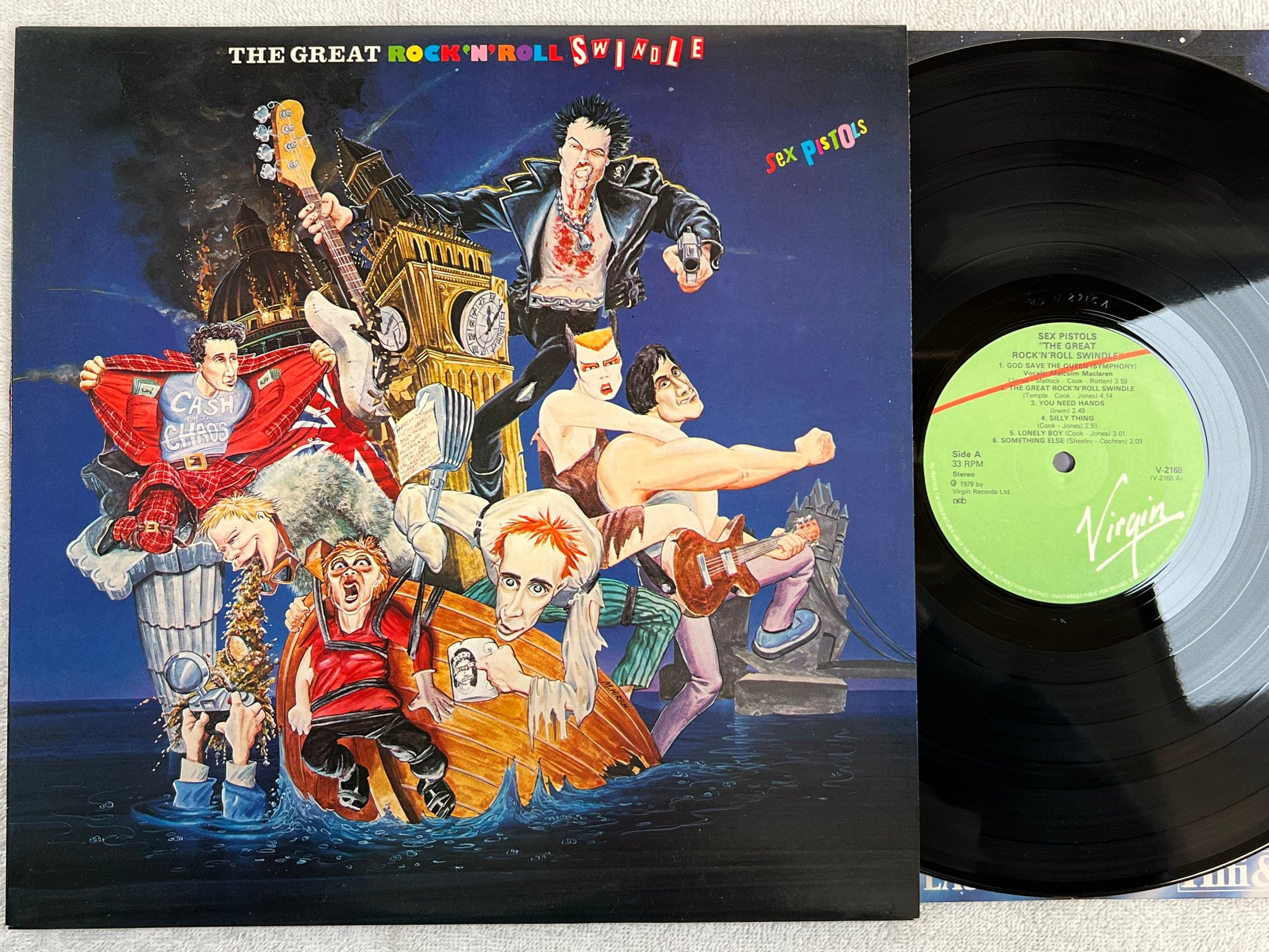 Omslagsbild för skivan SEX PISTOLS the great rock n roll swindle LP -79 ncb VIRGIN V 2168