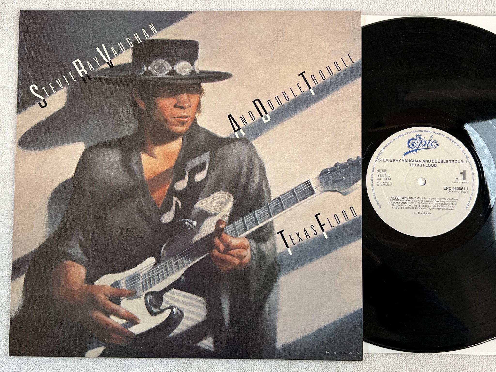 Omslagsbild för skivan STEVIE RAY VAUGHAN & DOUBLE TROUBLE Texas flood LP -83 Hol EPIC EPC 4609511