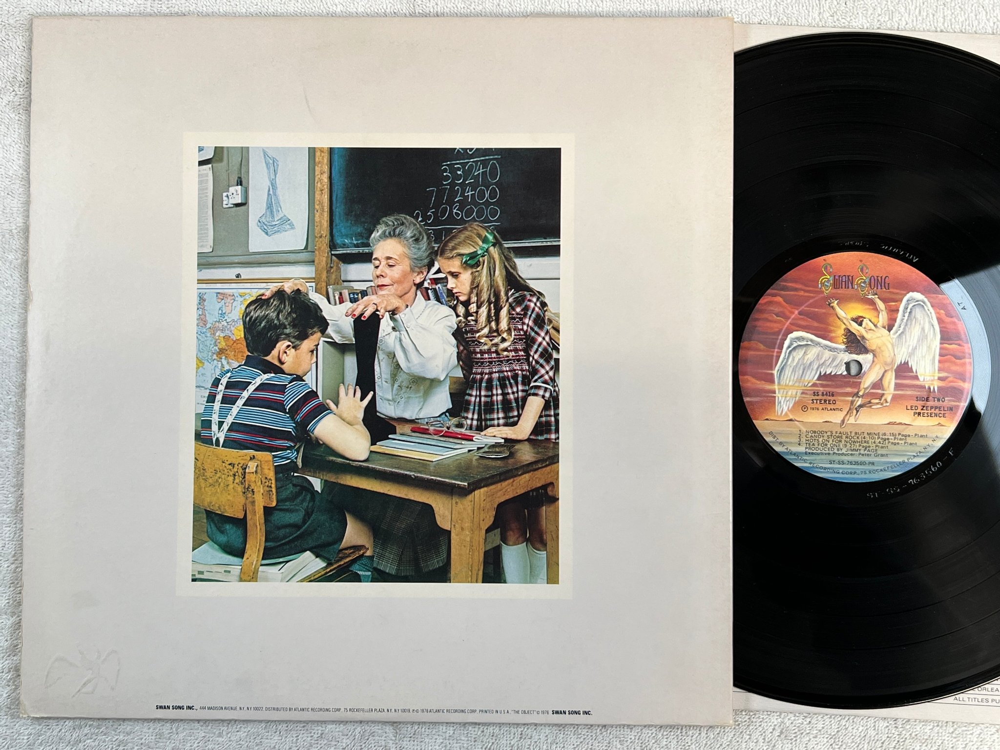 Omslagsbild för skivan LED ZEPPELIN presence LP -76 US SWAN SONG SS 8416