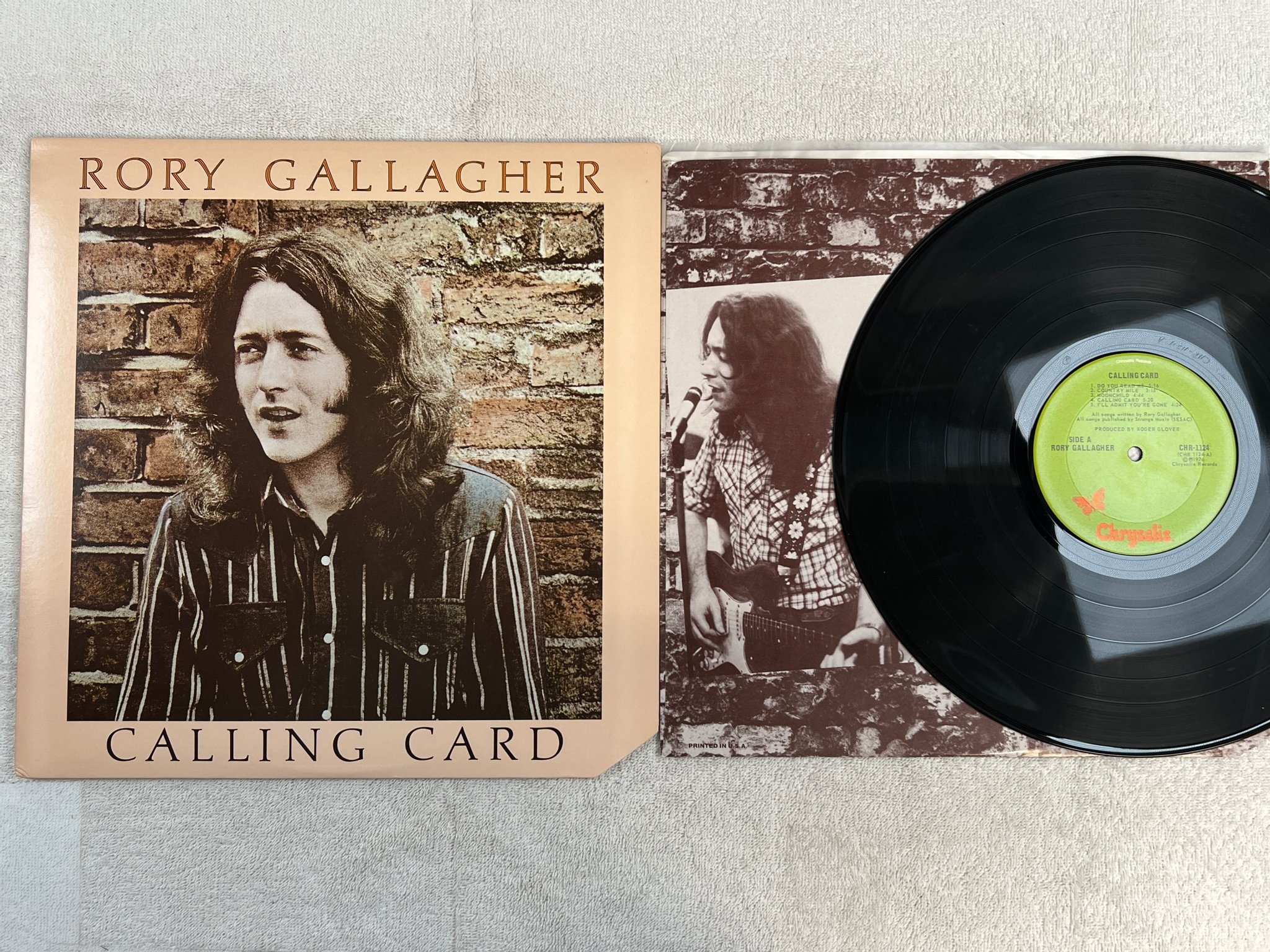 Omslagsbild för skivan RORY GALLAGHER calling card LP -76 US CHRYSALIS CHR 1124