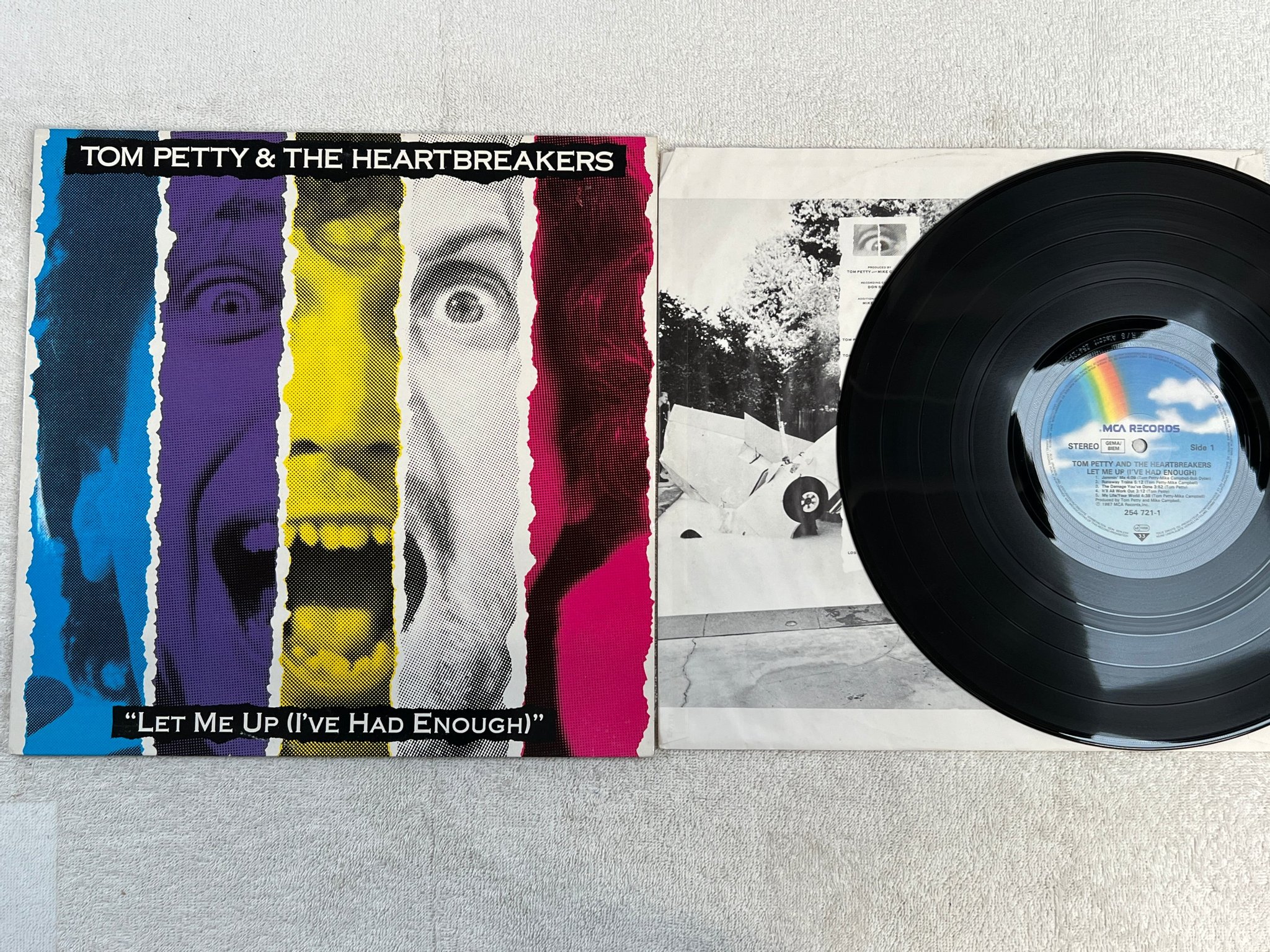 Omslagsbild för skivan TOM PETTY & THE HEARTBREAKERS let me up LP -87 Ger MCA 254721-1